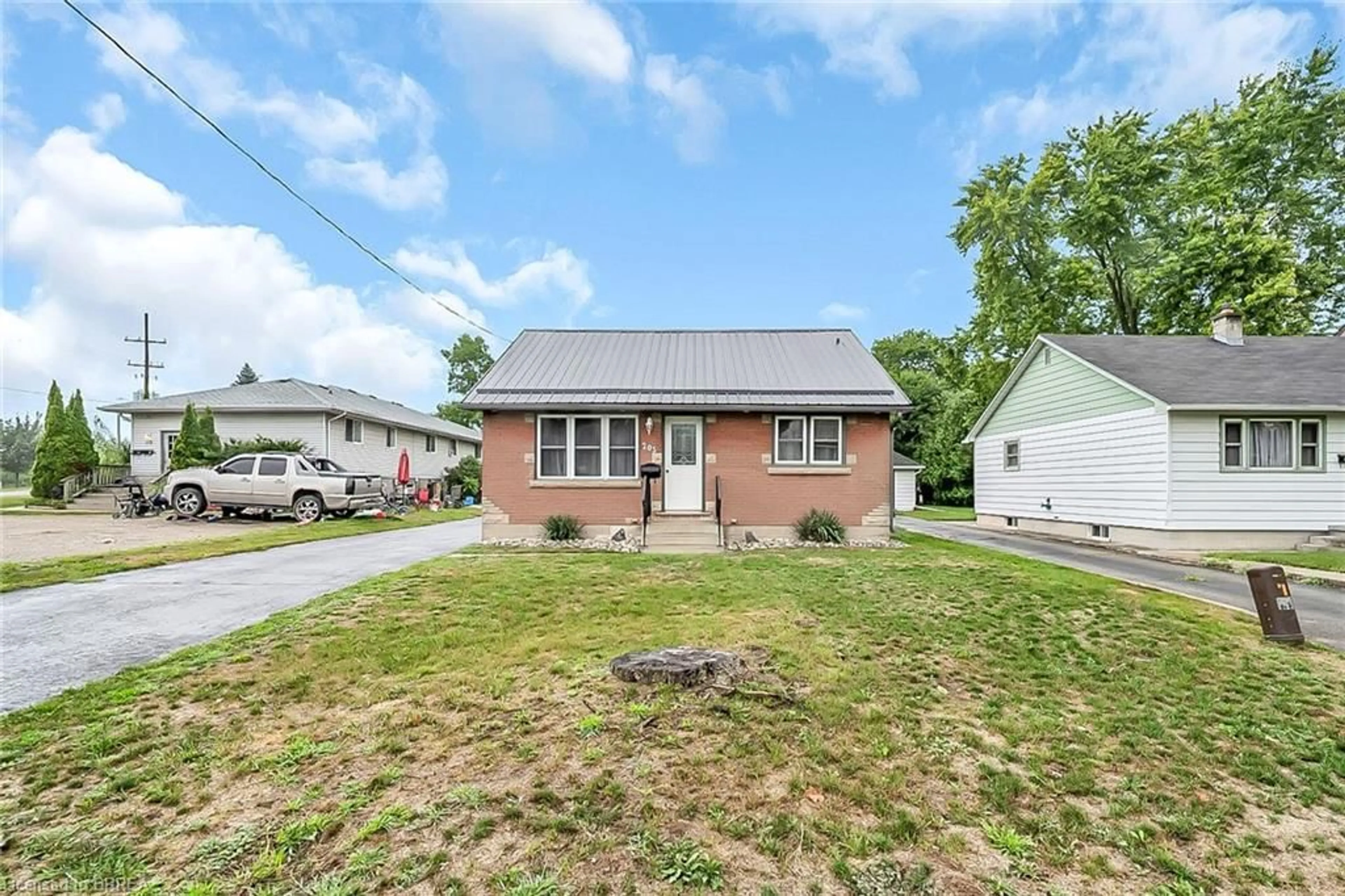 Home with brick exterior material, street for 205 Crysler St, Delhi Ontario N4B 1H9