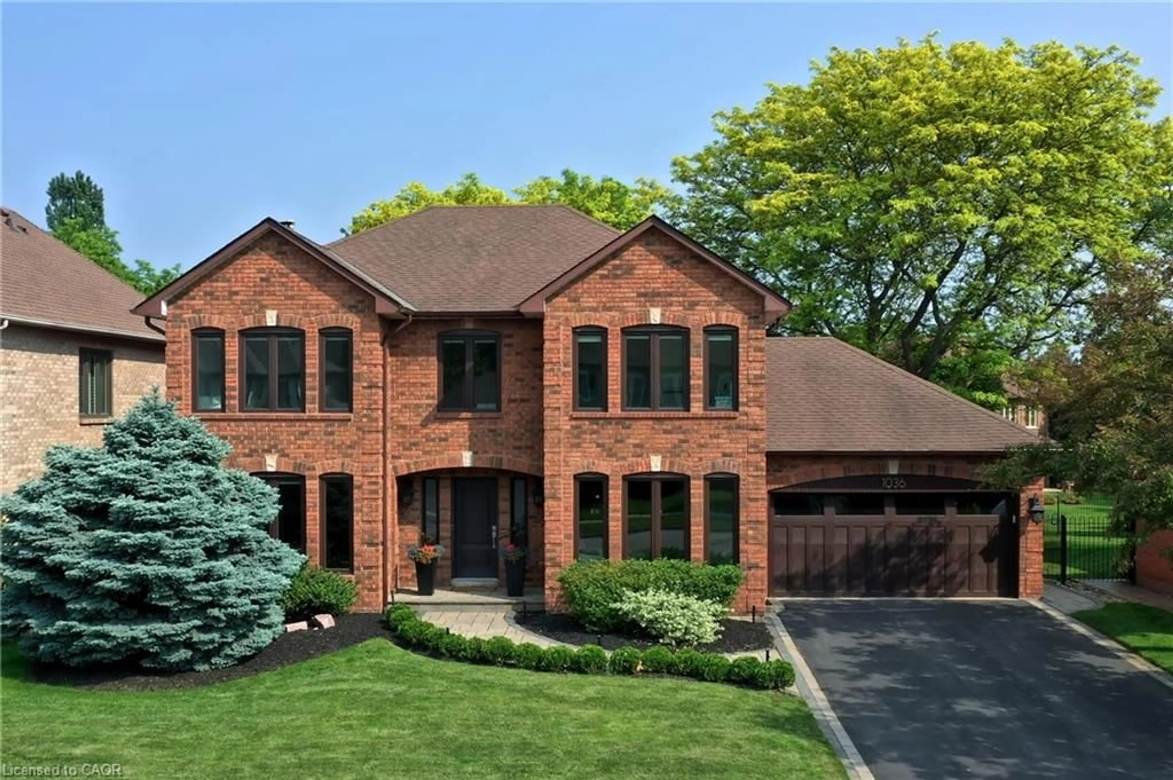 Home with brick exterior material, street for 1036 Masters Green, Oakville Ontario L6M 2N7