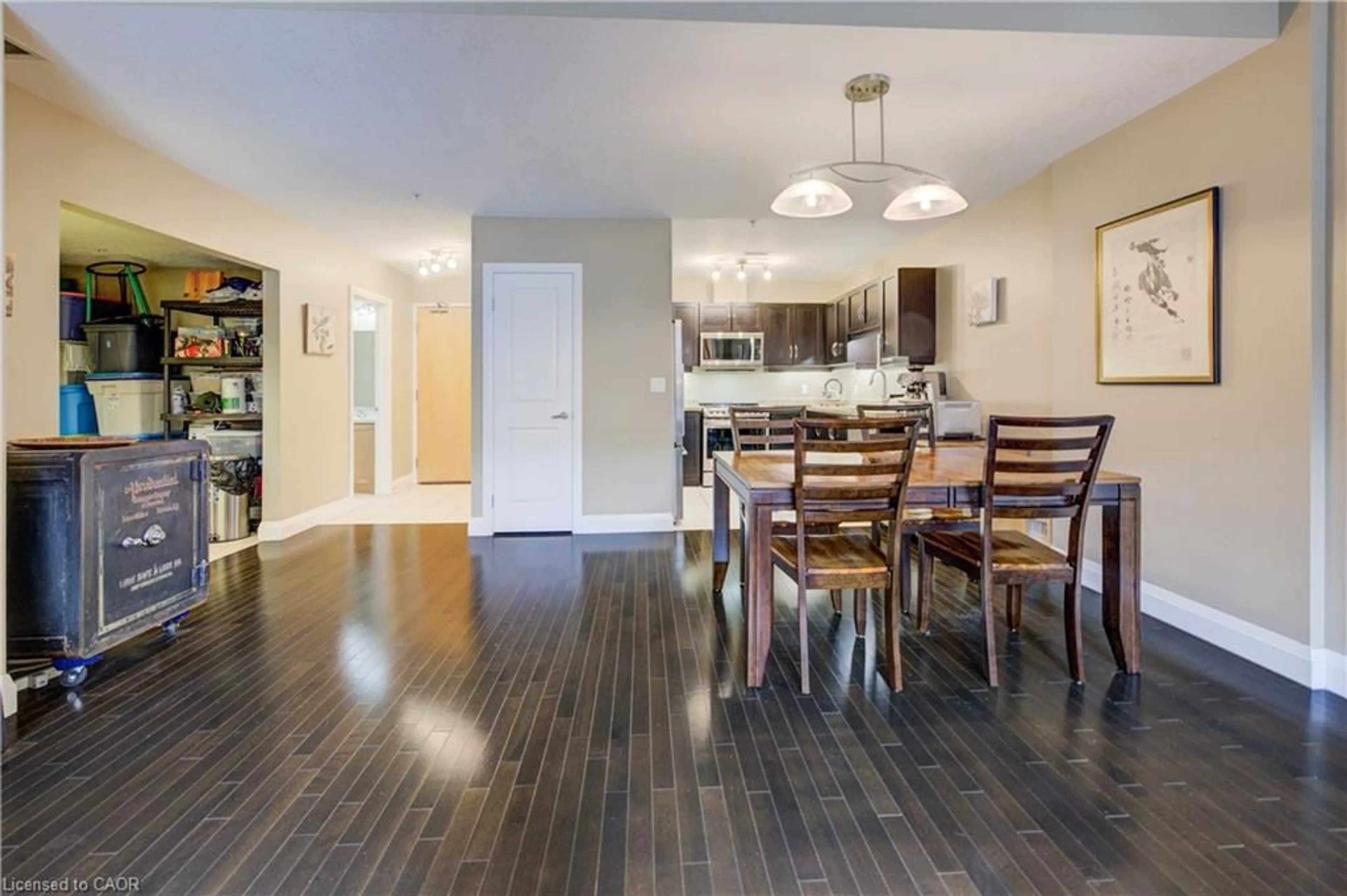 Dining room, wood/laminate floor for 165 Duke St #105, Kitchener Ontario N2H 6T8