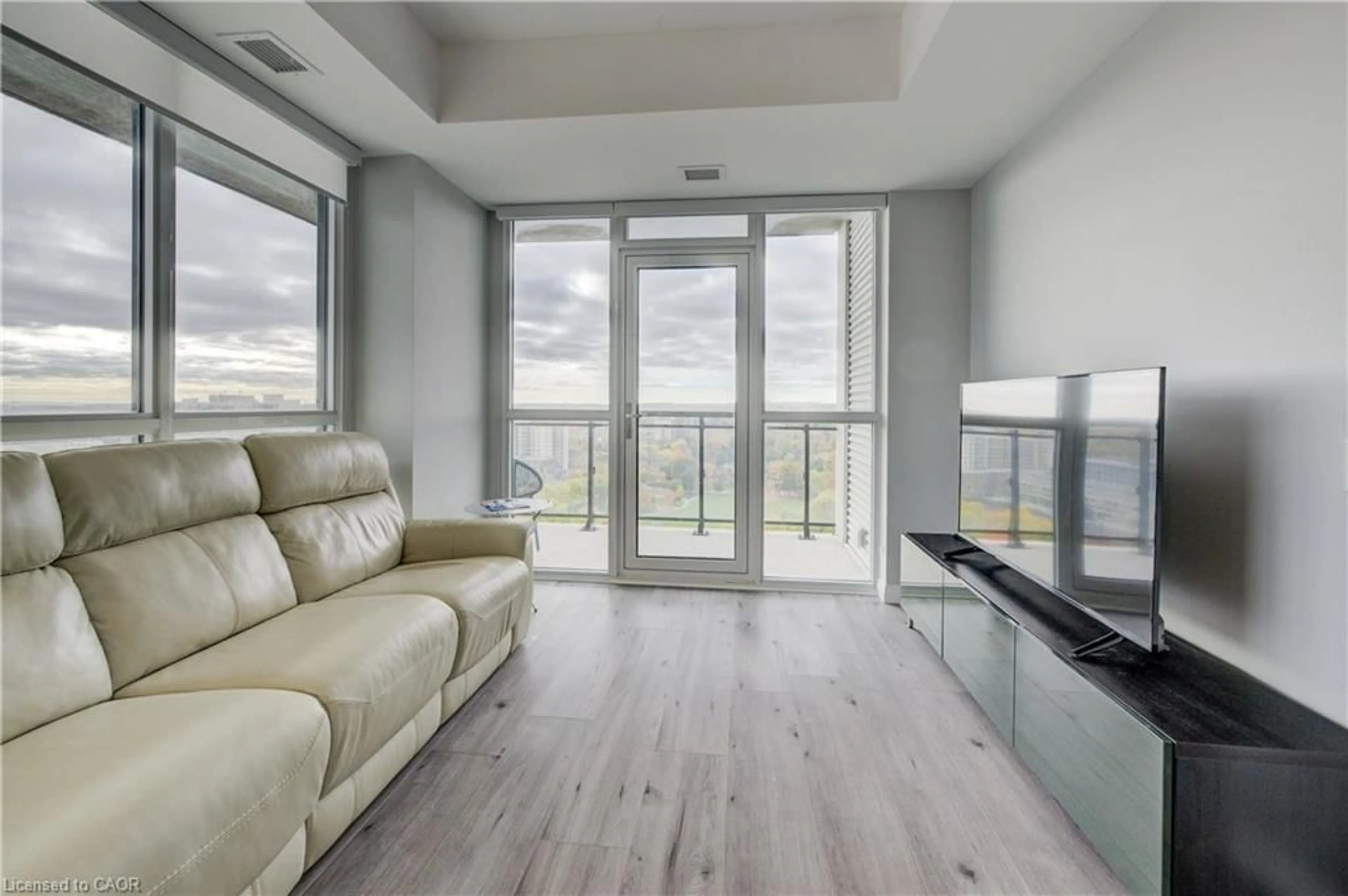 Living room with furniture, unknown for 60 Charles St #1805, Kitchener Ontario N2G 0C9