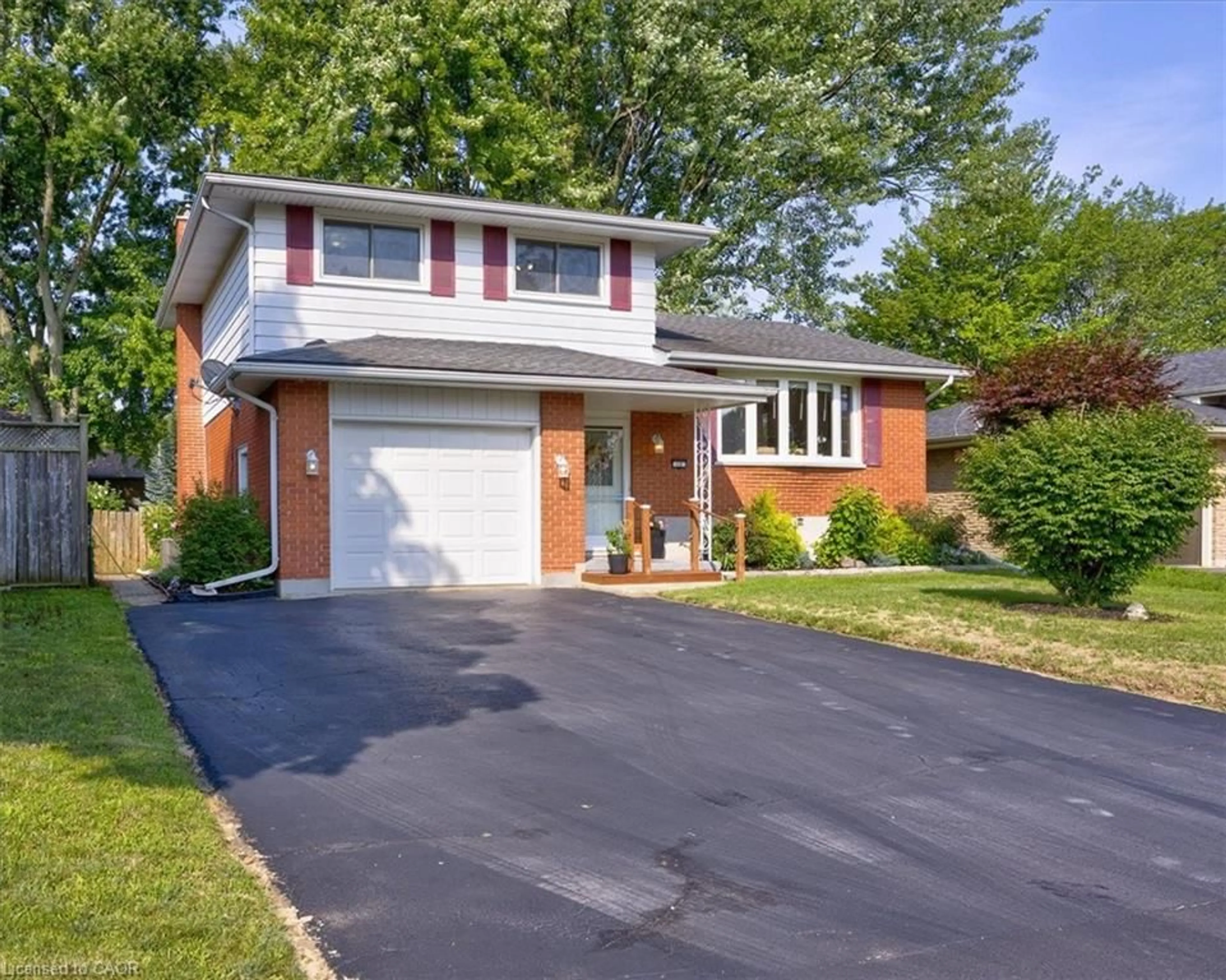 Home with brick exterior material, street for 12 Miller Cres, Simcoe Ontario N3Y 4R1