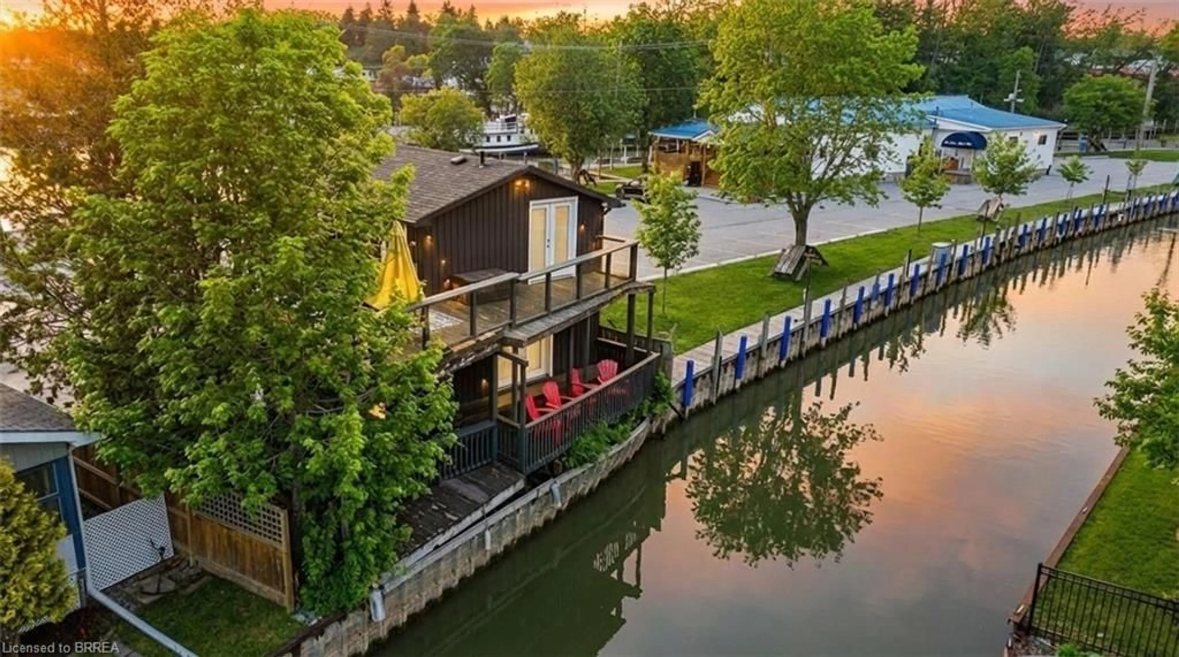 A pic from outside/outdoor area/front of a property/back of a property/a pic from drone, water/lake/river/ocean view for 52 River Dr, Port Dover Ontario N0A 1N7