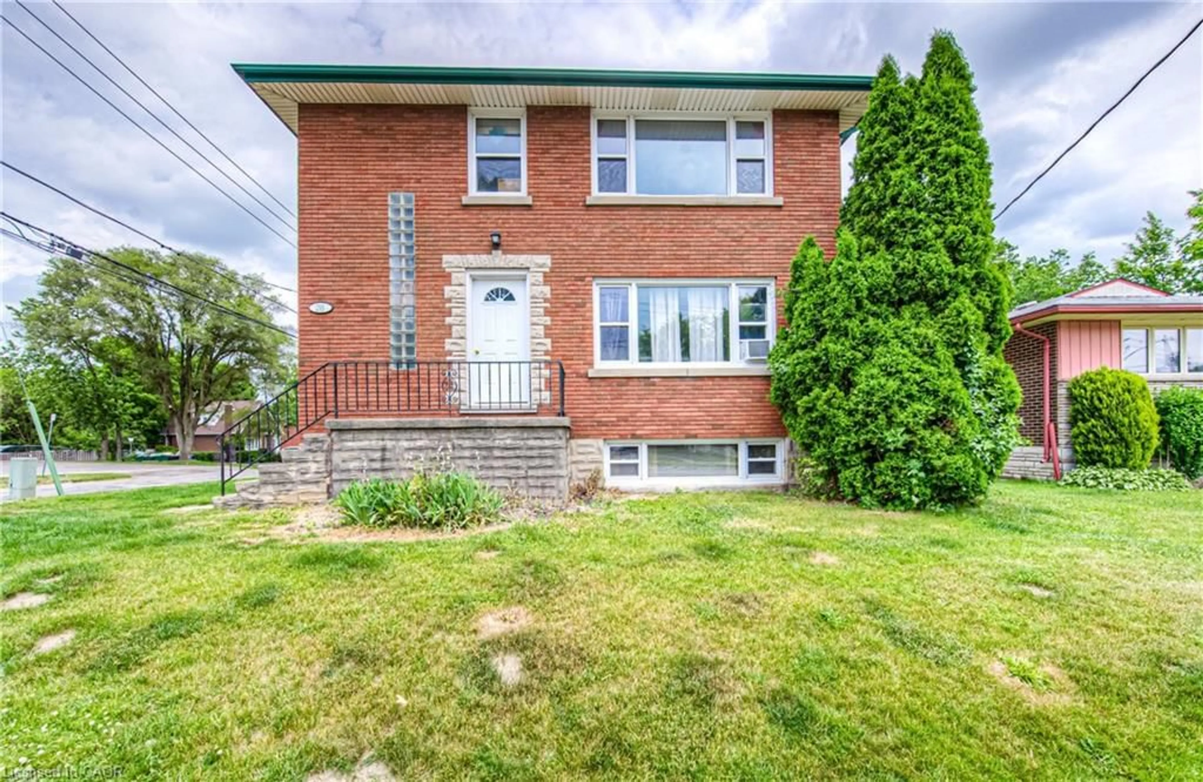 Home with brick exterior material, street for 218 Margaret Ave, Kitchener Ontario N2H 4J2