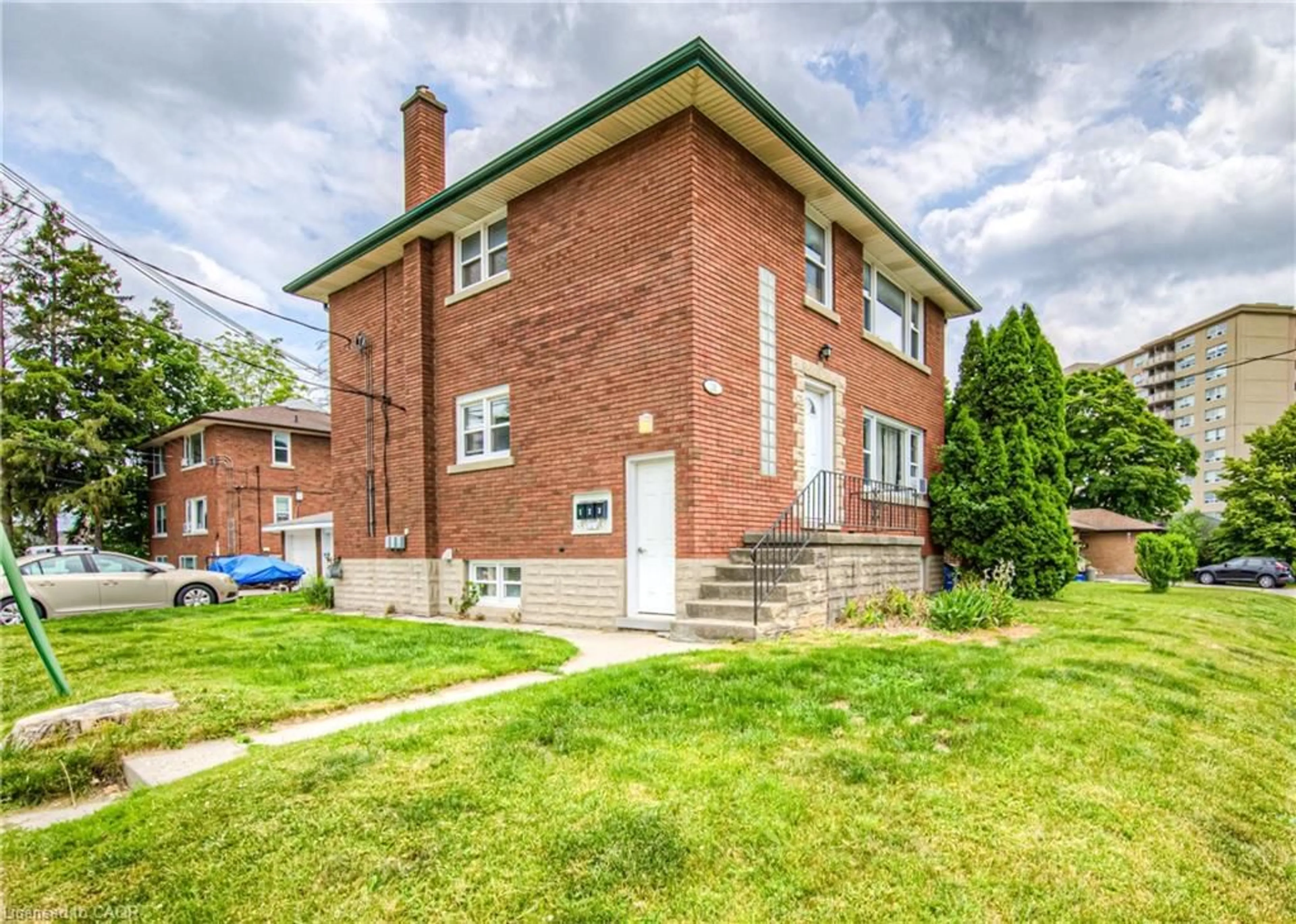Home with brick exterior material, street for 218 Margaret Ave, Kitchener Ontario N2H 4J2