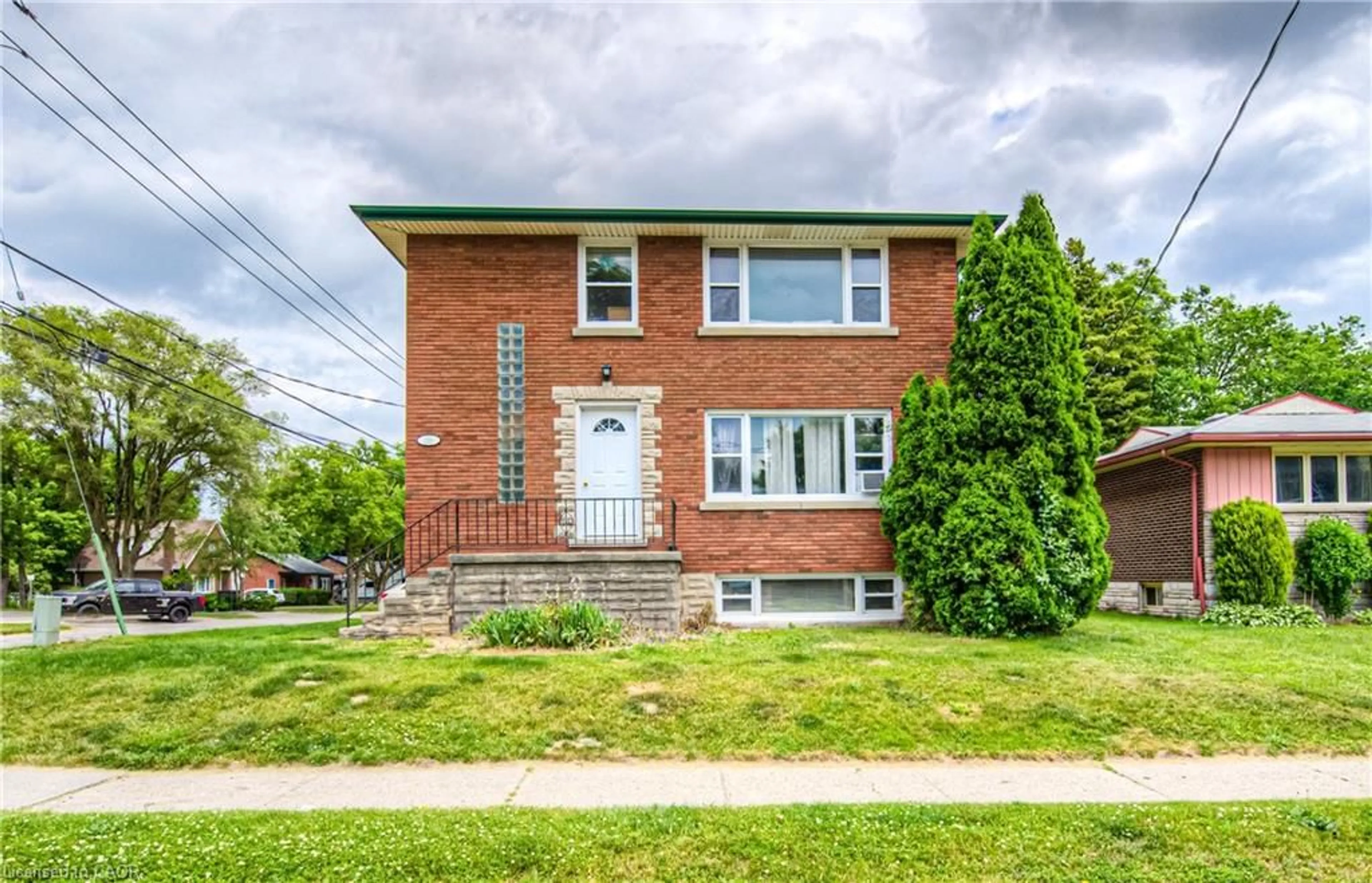 Home with brick exterior material, street for 218 Margaret Ave, Kitchener Ontario N2H 4J2