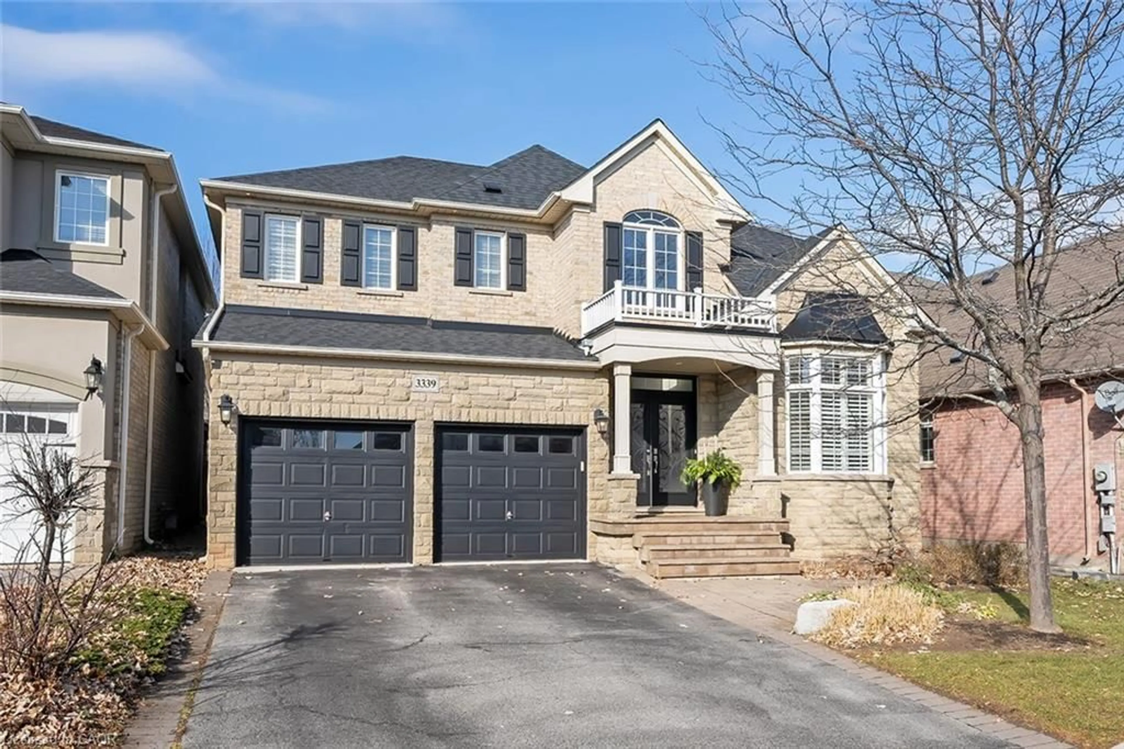 Home with brick exterior material, street for 3339 Skipton Lane, Oakville Ontario L6M 0K3