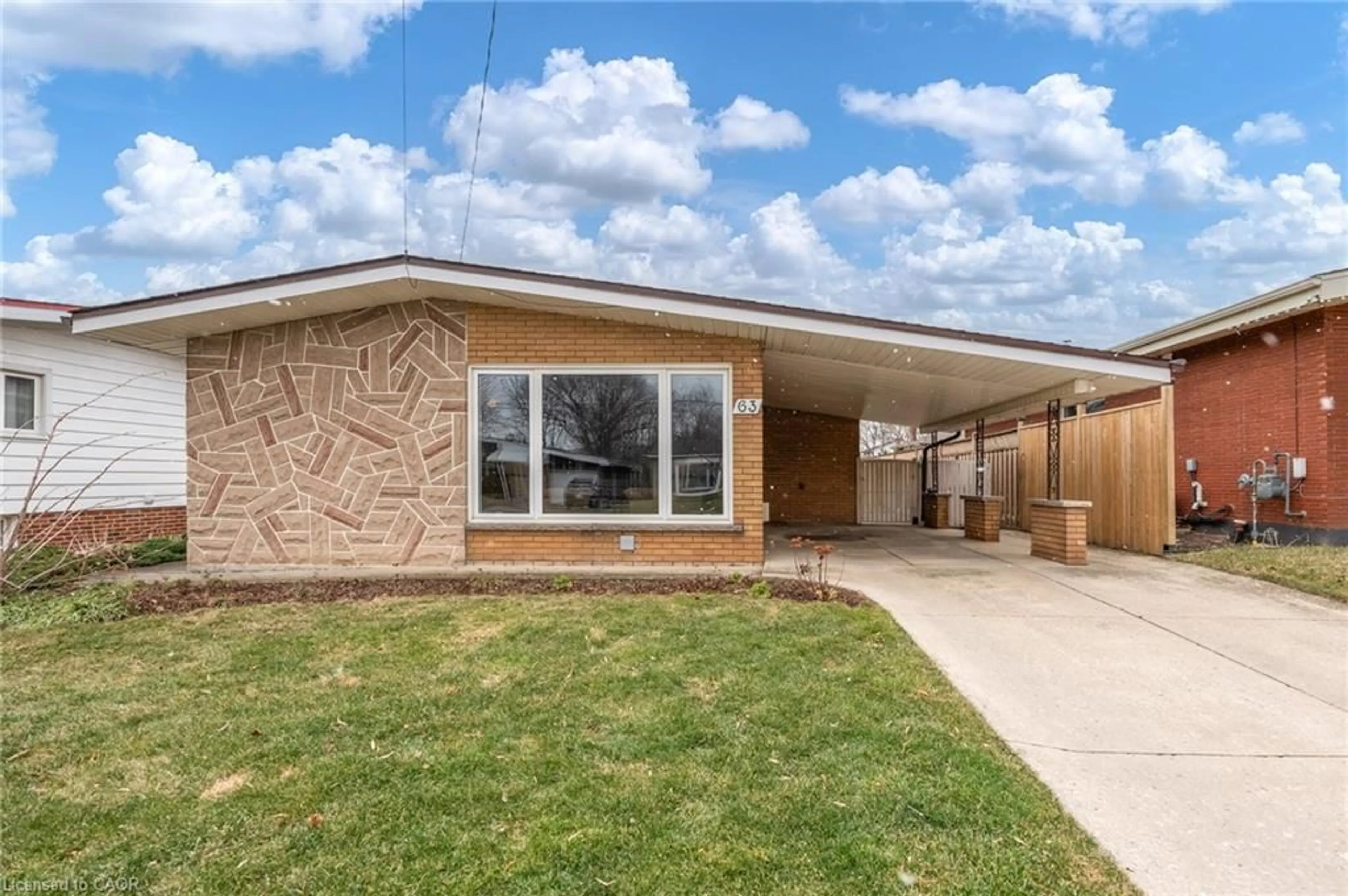 Home with brick exterior material, street for 63 Sunrise Dr, Hamilton Ontario L8K 4C4