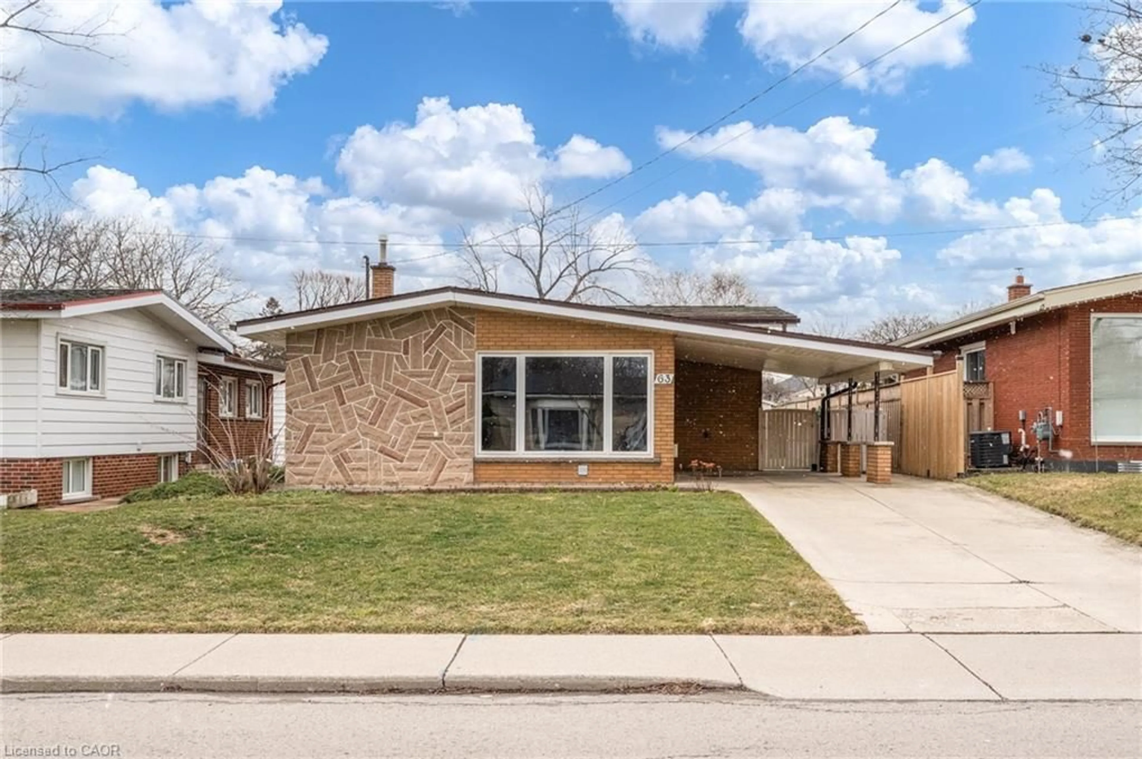 Home with brick exterior material, street for 63 Sunrise Dr, Hamilton Ontario L8K 4C4