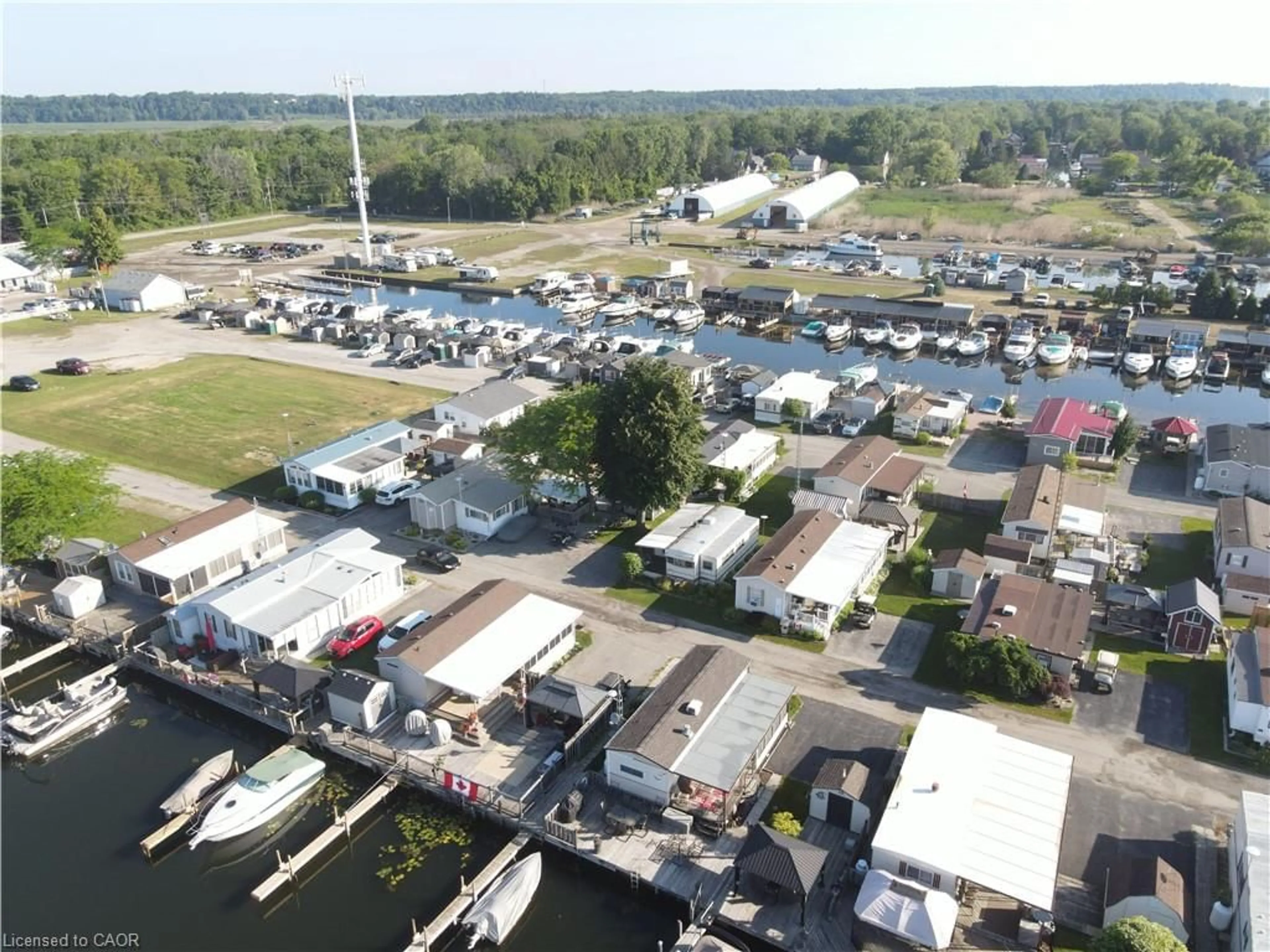 A pic from outside/outdoor area/front of a property/back of a property/a pic from drone, water/lake/river/ocean view for 92 Clubhouse Rd #35, Turkey Point Ontario N0E 1T0