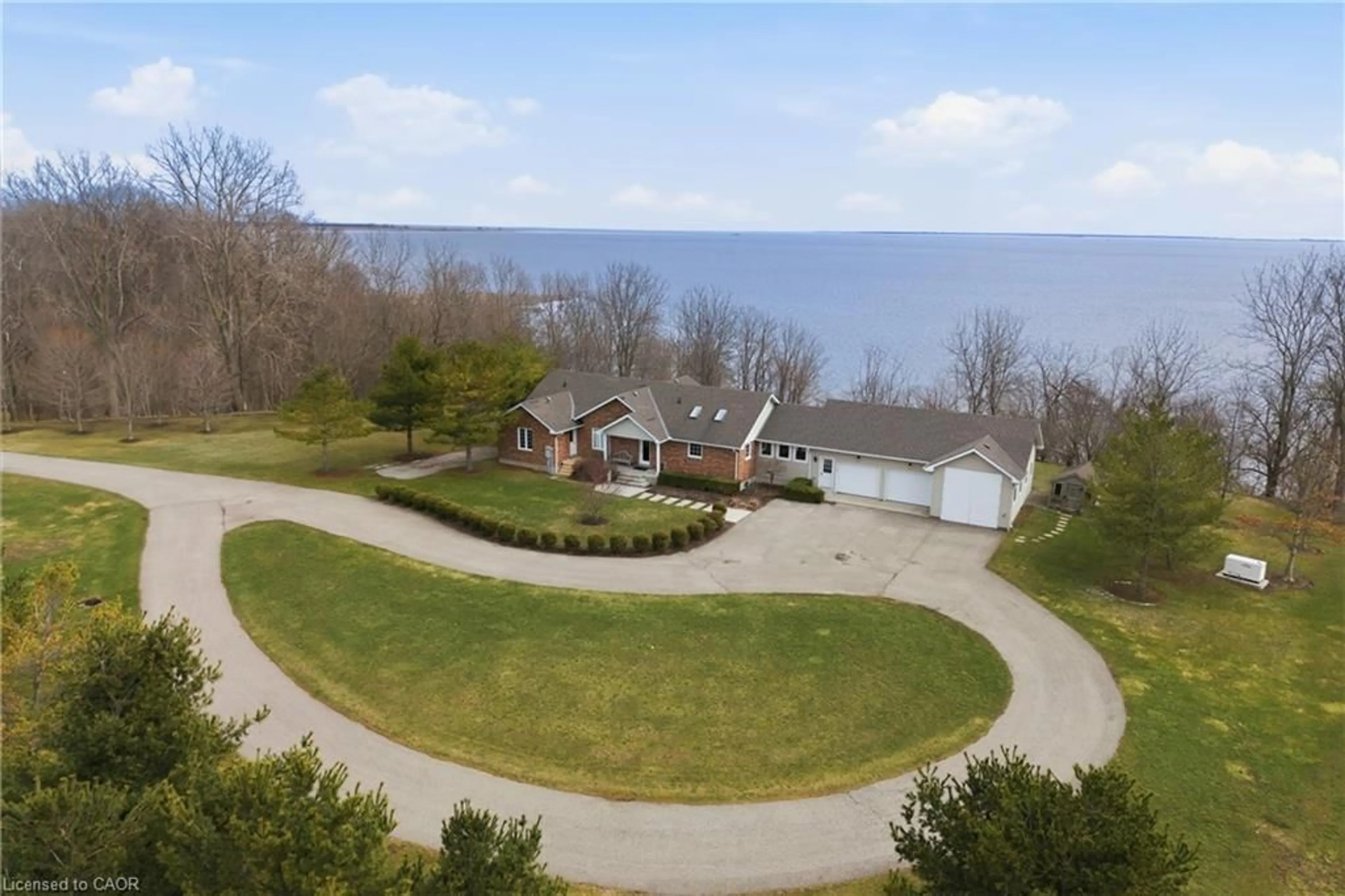 A pic from outside/outdoor area/front of a property/back of a property/a pic from drone, water/lake/river/ocean view for 648 Front Rd, St. Williams Ontario N0E 1P0