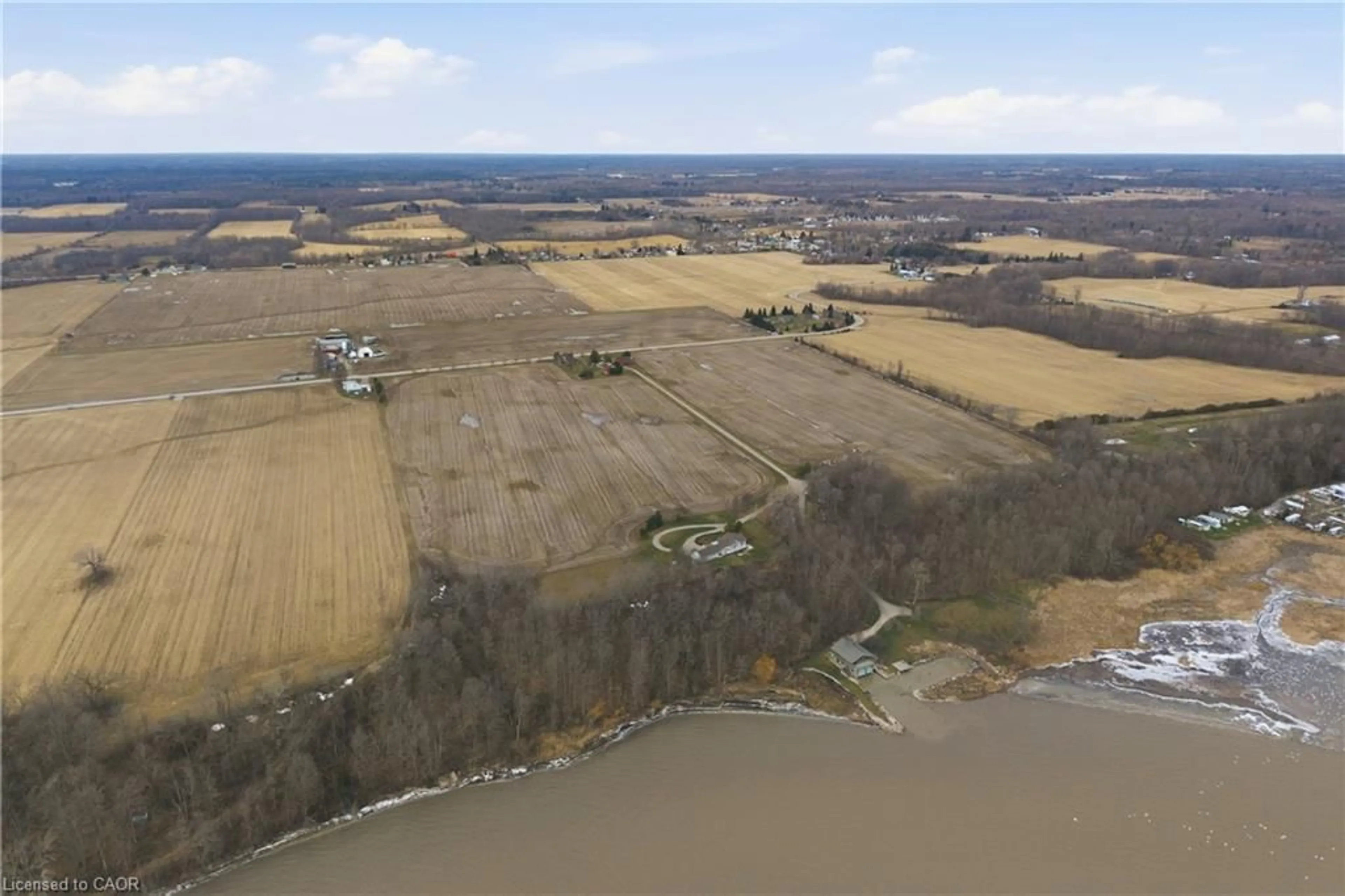 A pic from outside/outdoor area/front of a property/back of a property/a pic from drone, water/lake/river/ocean view for 648 Front Rd, St. Williams Ontario N0E 1P0