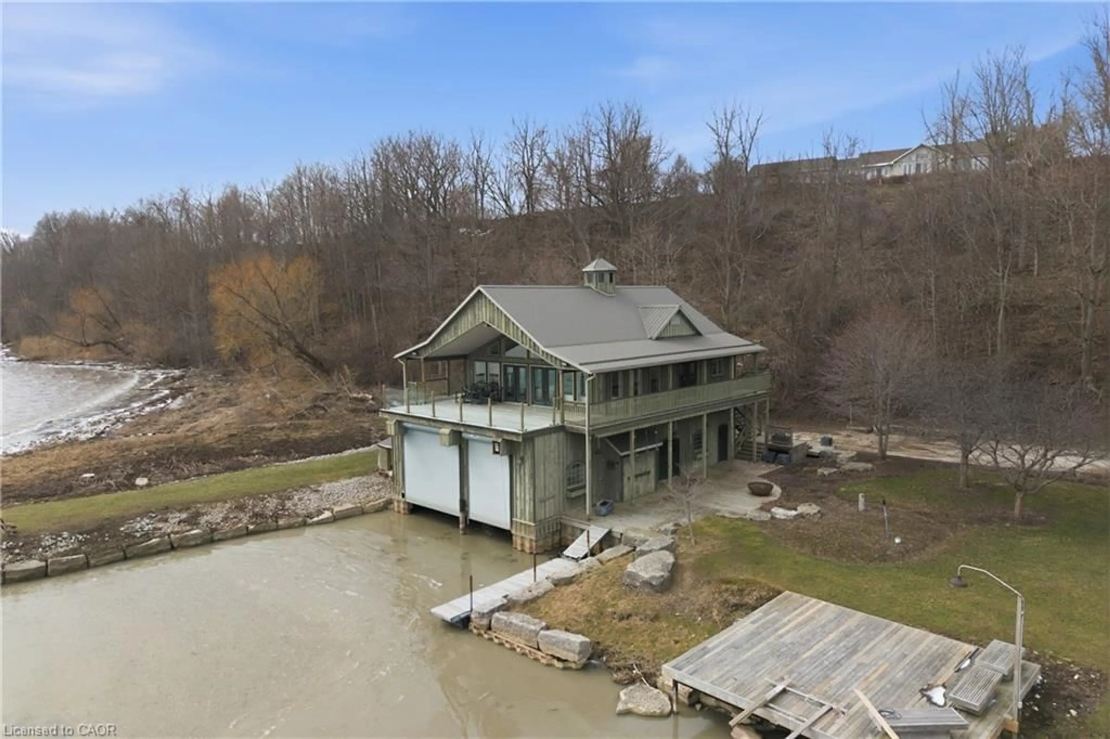 A pic from outside/outdoor area/front of a property/back of a property/a pic from drone, water/lake/river/ocean view for 648 Front Rd, St. Williams Ontario N0E 1P0