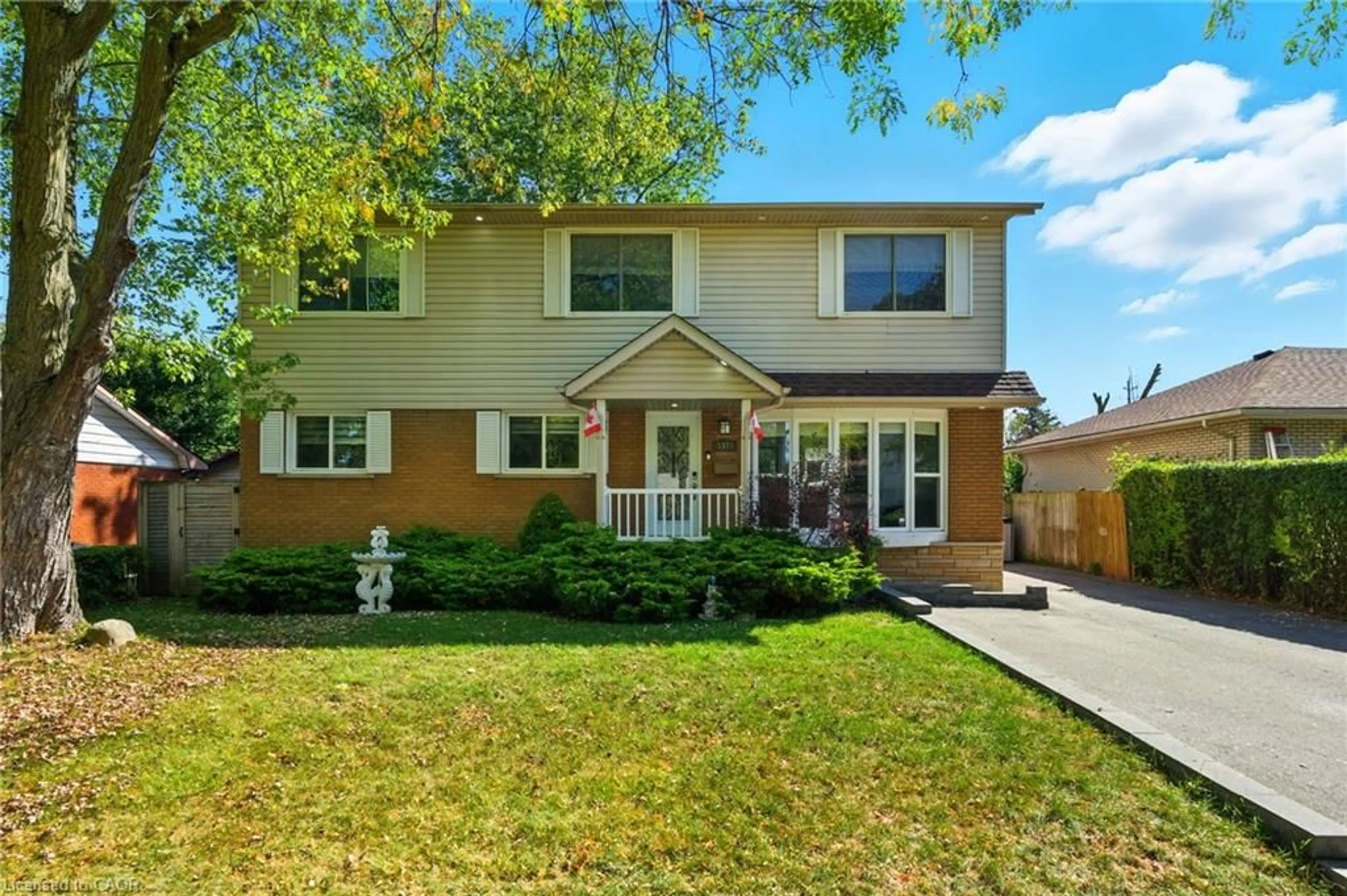 Home with brick exterior material, street for 5372 Spruce Ave, Burlington Ontario L7L 1N7