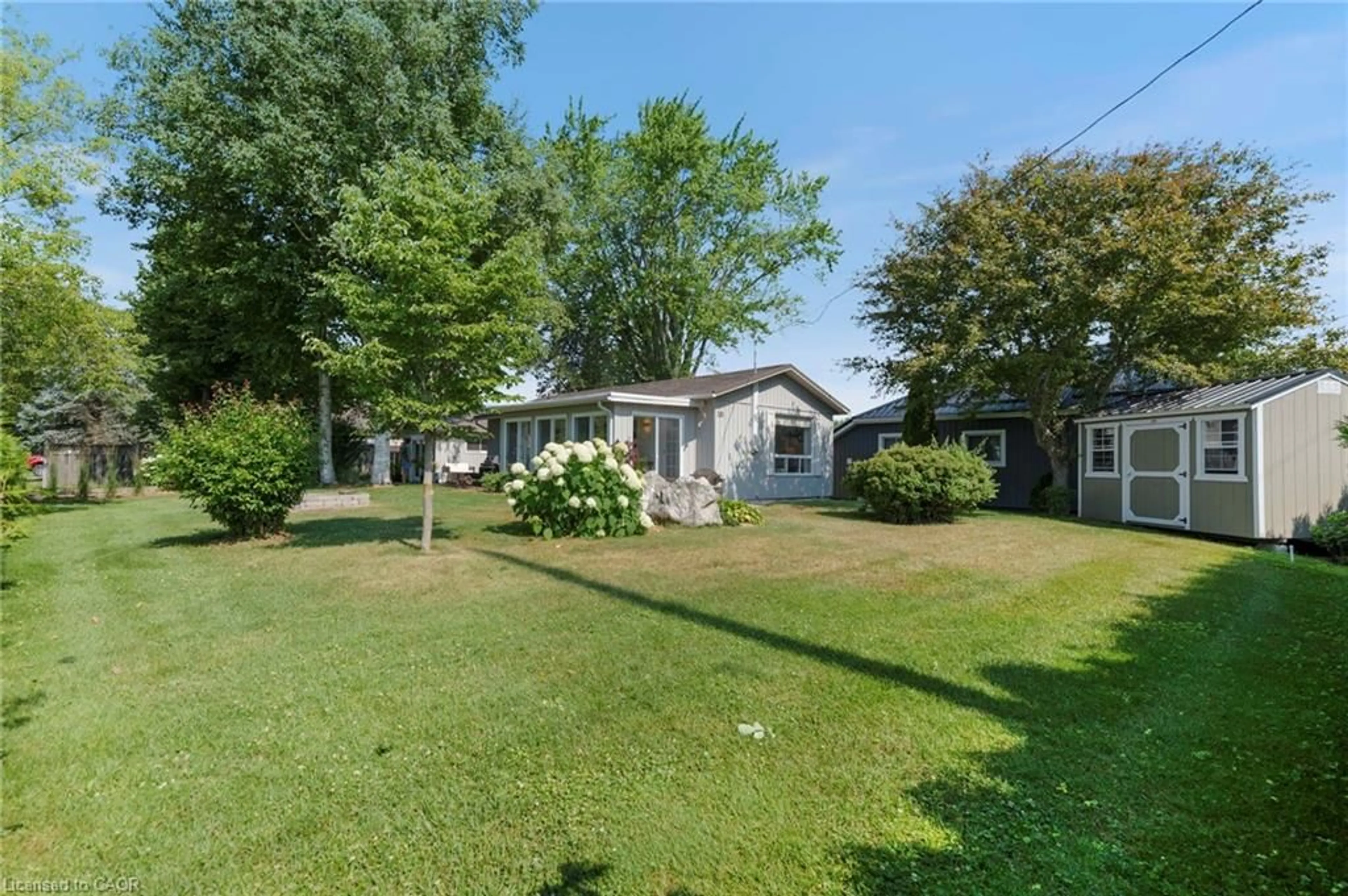 A pic from outside/outdoor area/front of a property/back of a property/a pic from drone, unknown for 181 Cedar Dr, Turkey Point Ontario N0E 1T0