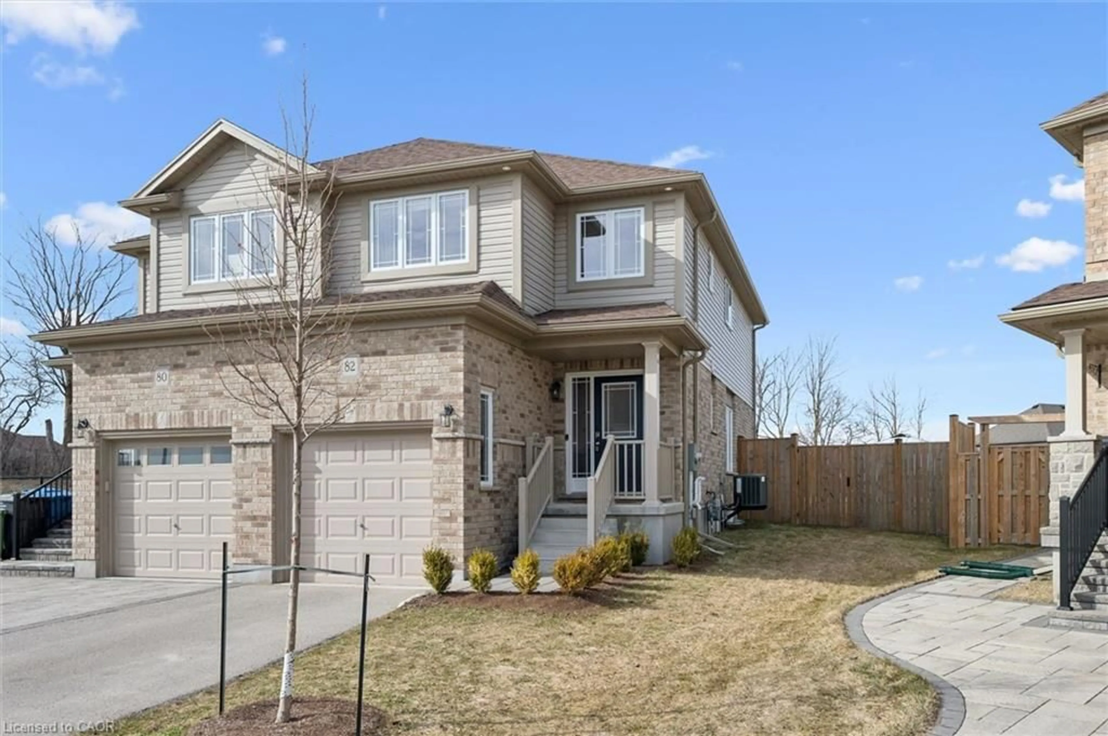 Home with brick exterior material, street for 82 John Brabson Cres, Guelph Ontario N1G 0G7
