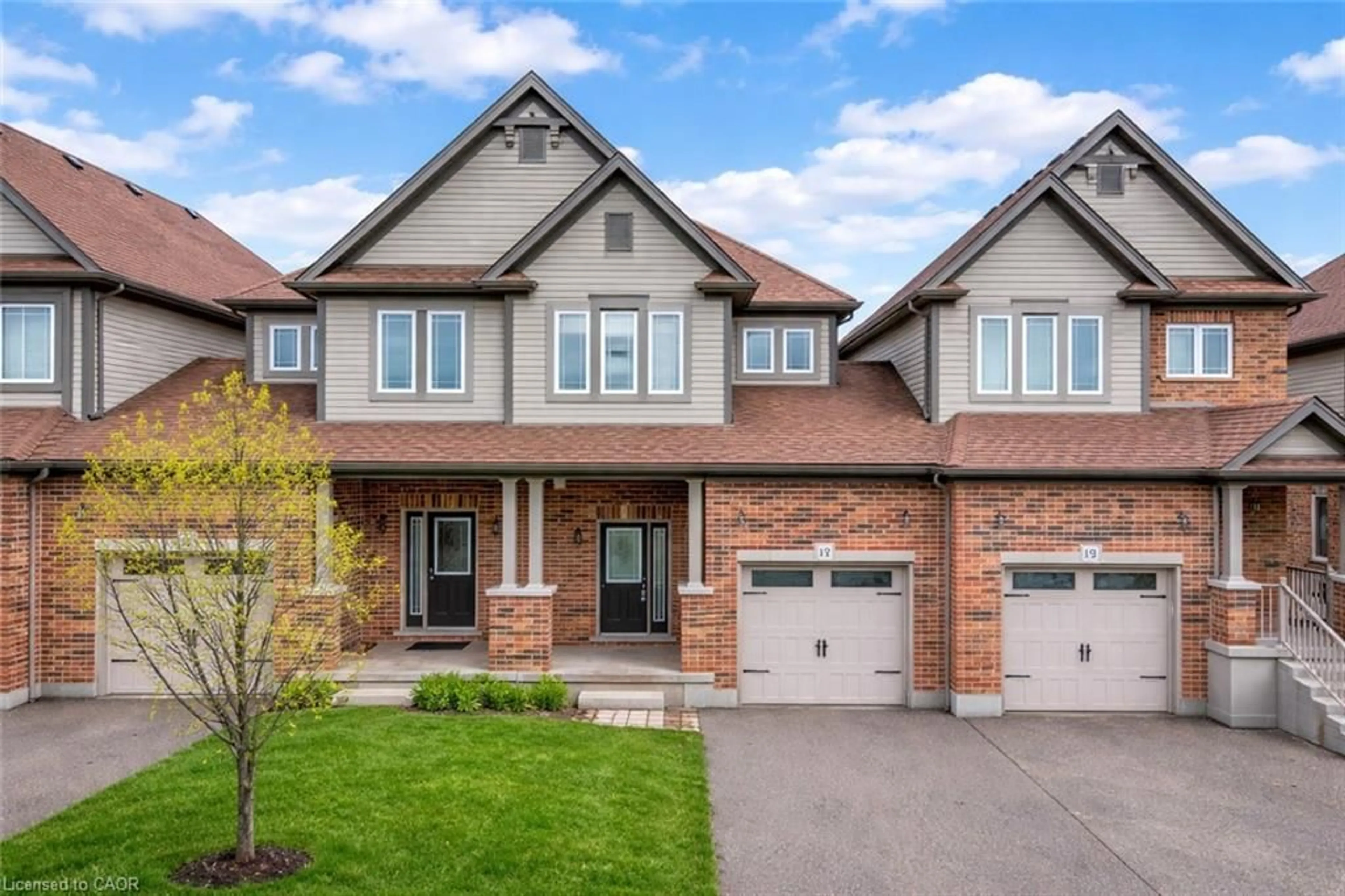 Home with brick exterior material, street for 17 Valleybrook Dr, Kitchener Ontario N2A 0J9