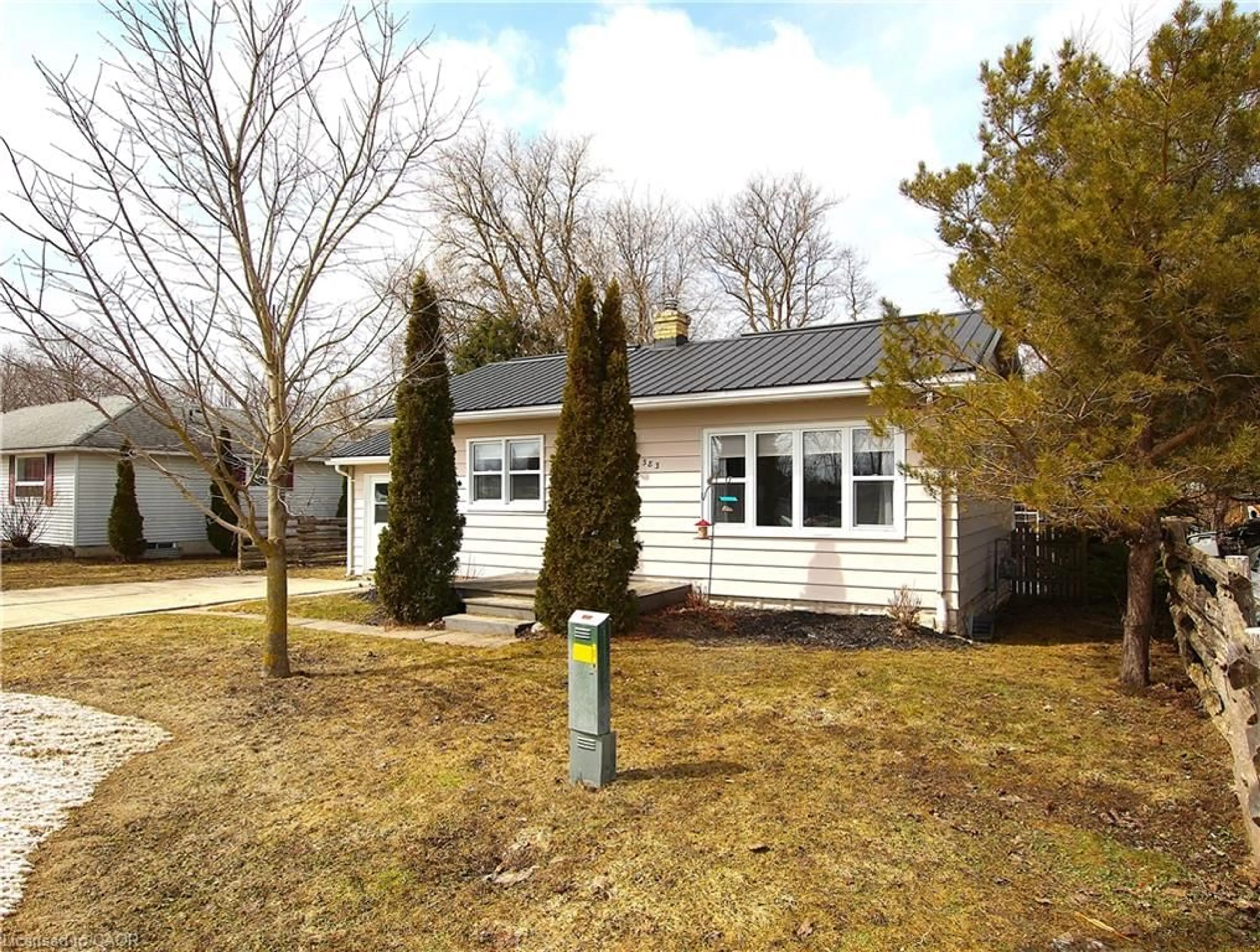 Home with vinyl exterior material, street for 383 Wellington St, Mount Forest Ontario N0G 2L2