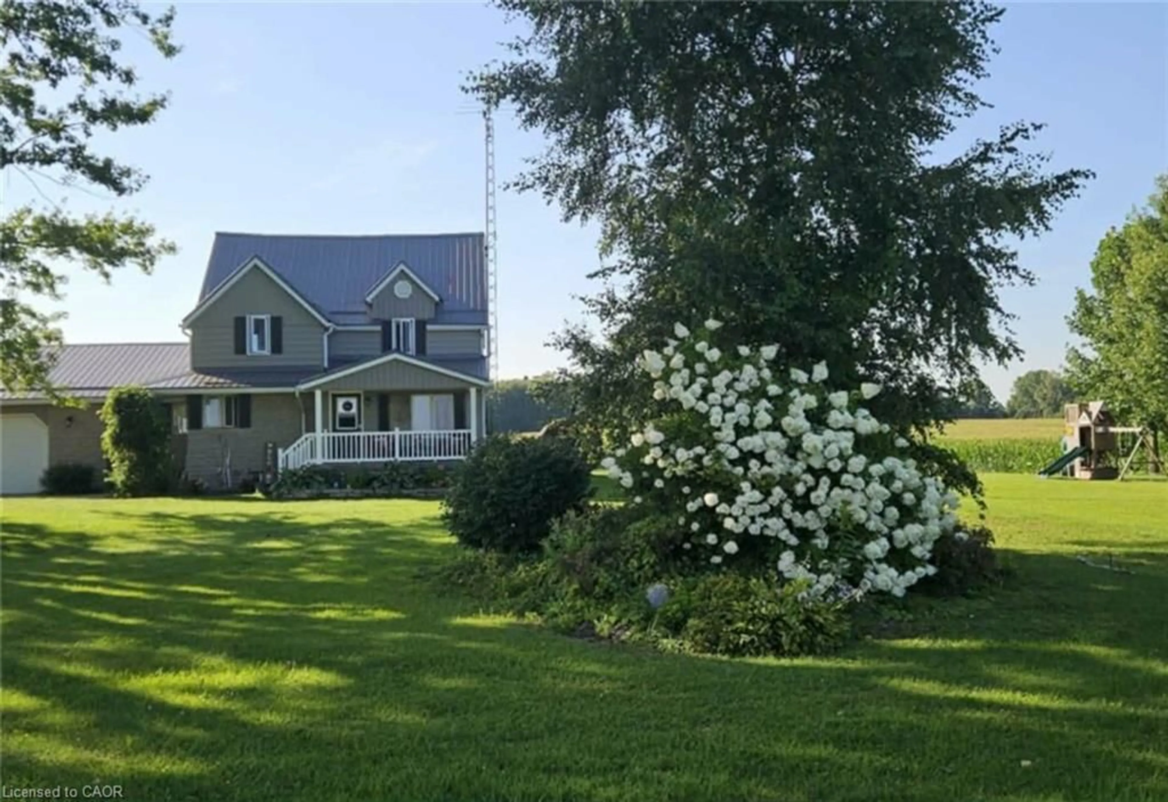 A pic from outside/outdoor area/front of a property/back of a property/a pic from drone, mountain view for 20662 Marsh Line, Rodney Ontario N0L 2C0