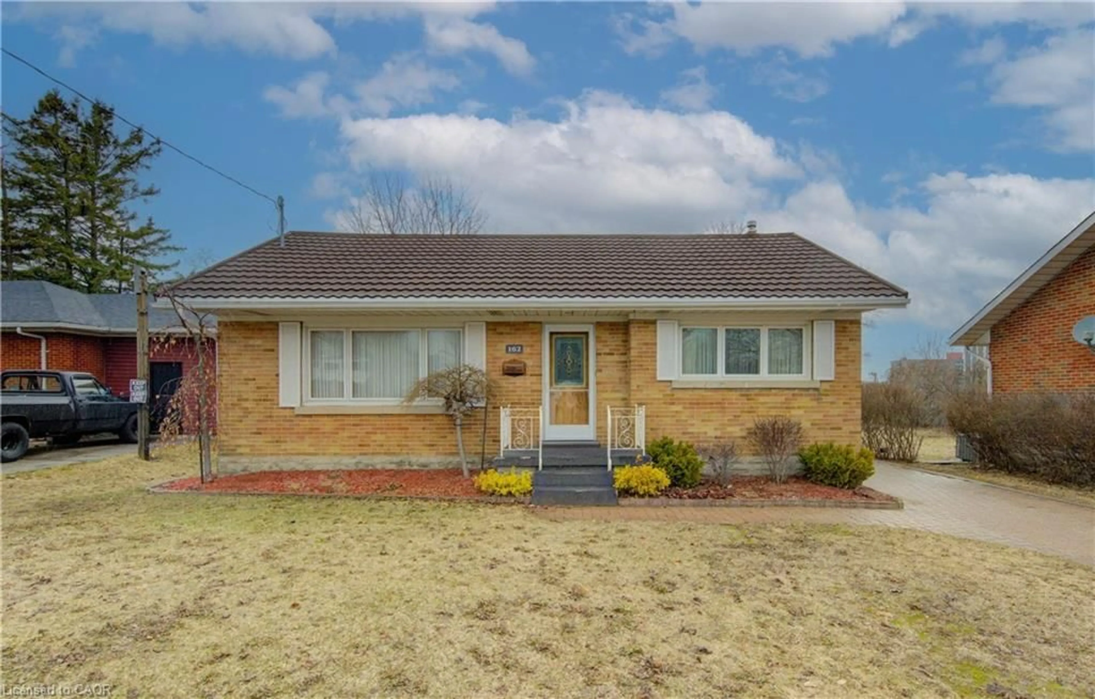 Home with brick exterior material, street for 162 Erb St, Waterloo Ontario N2J 1M4