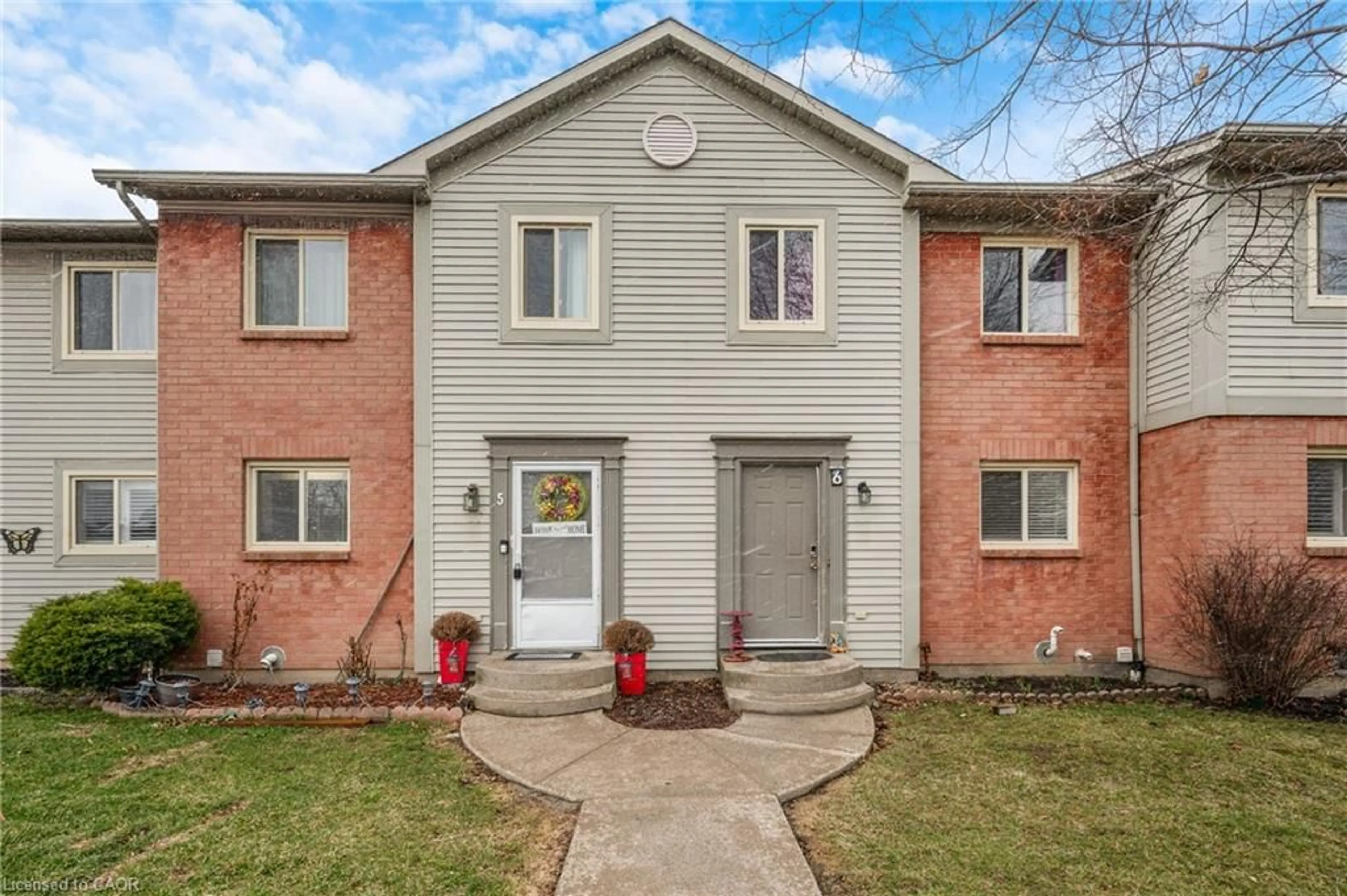 Home with brick exterior material, street for 65 Dorchester St #5, St. Catharines Ontario L2M 7S9