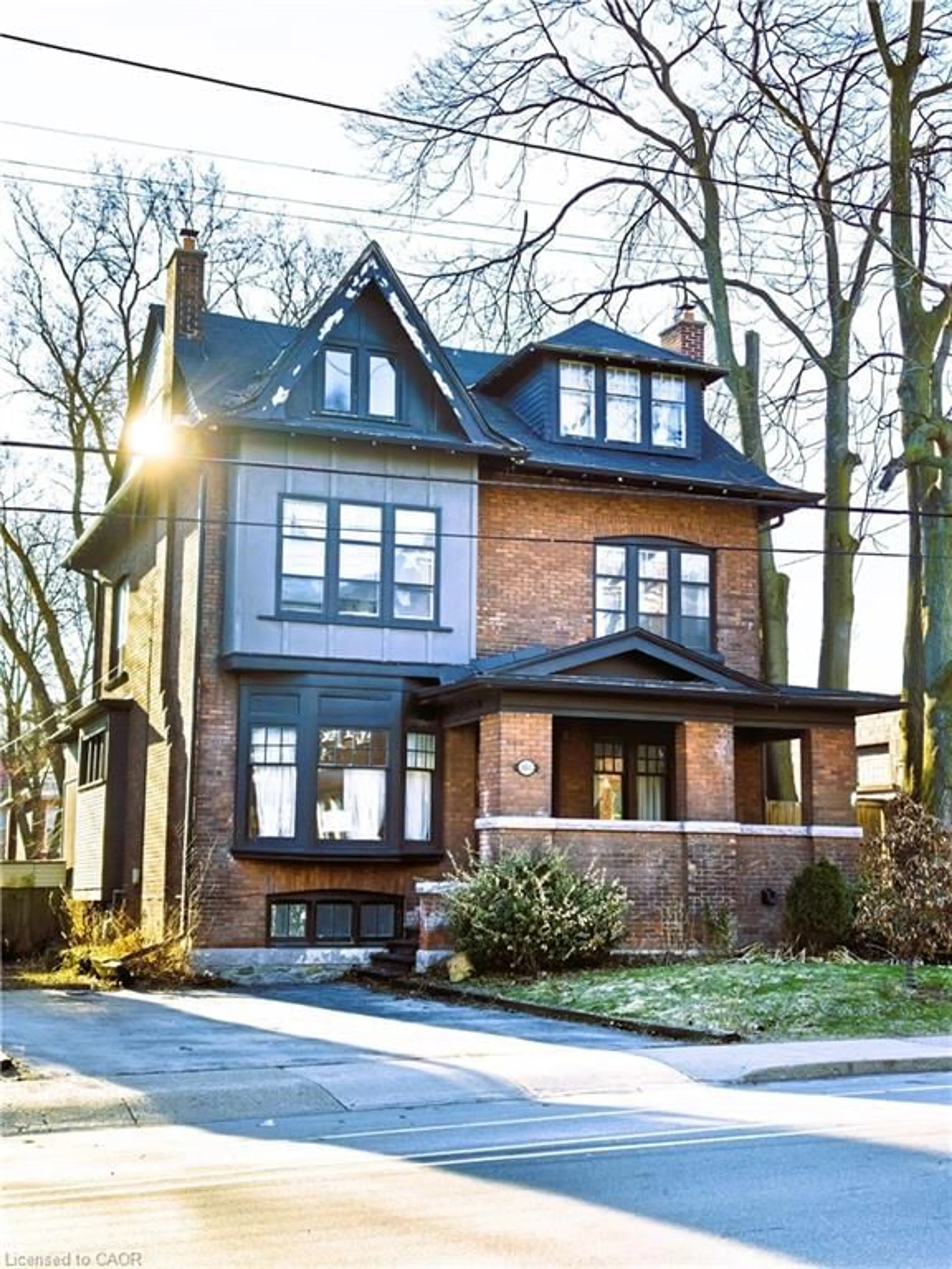 Home with brick exterior material, street for 103 Sherman Ave, Hamilton Ontario L8M 2P8