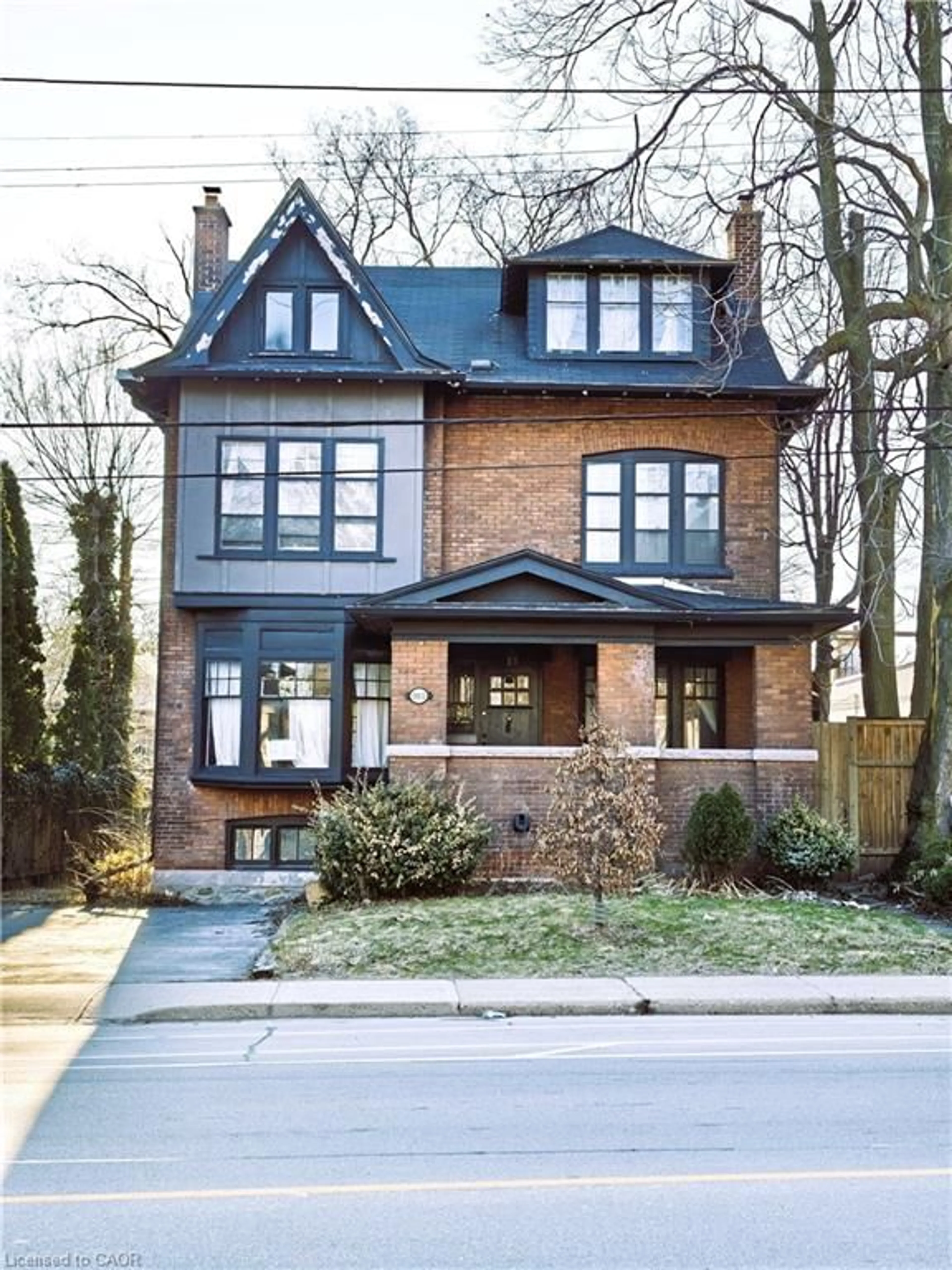 Home with brick exterior material, street for 103 Sherman Ave, Hamilton Ontario L8M 2P8