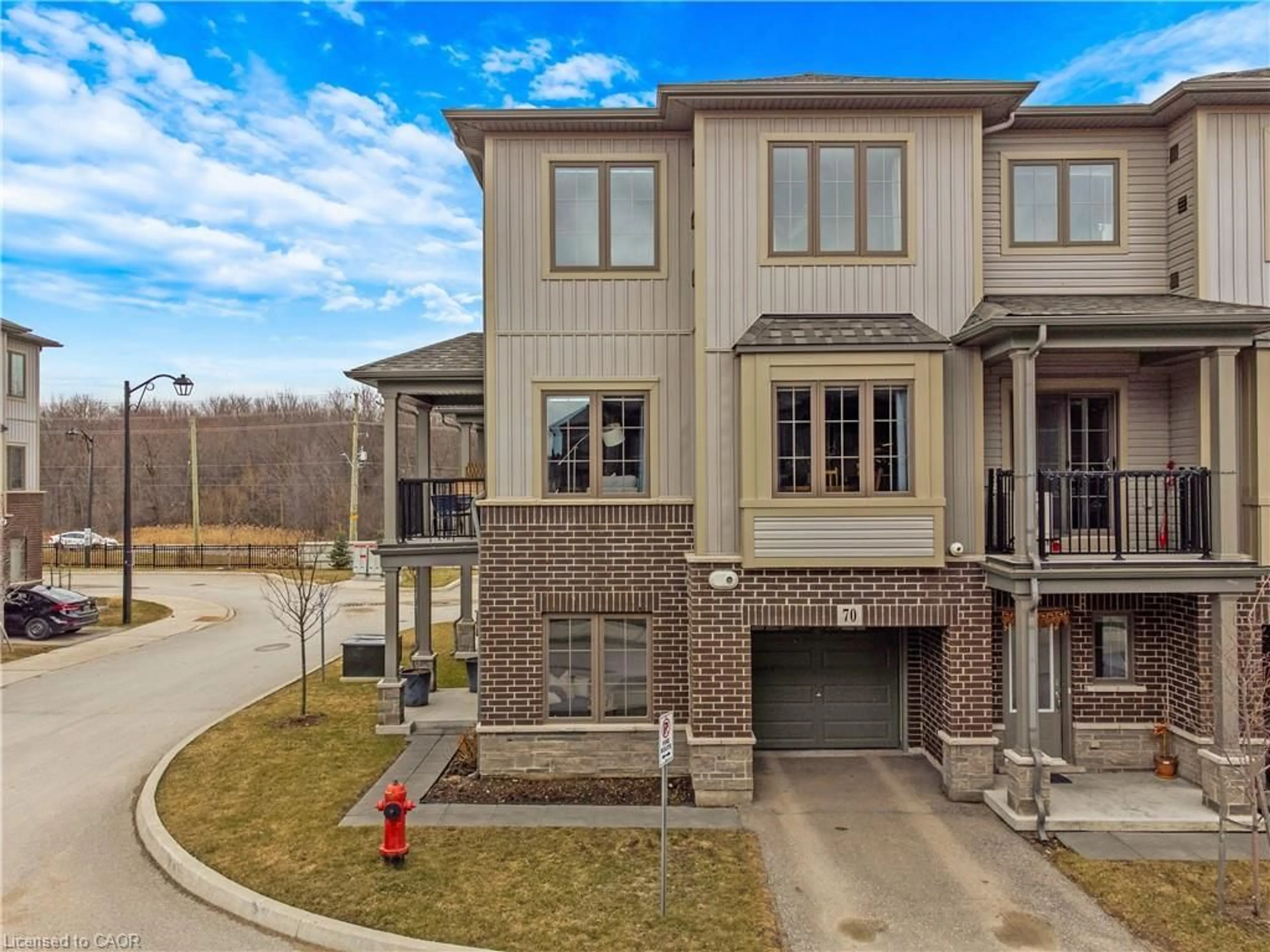 A pic from outside/outdoor area/front of a property/back of a property/a pic from drone, street for 124 Compass Trail #70, Cambridge Ontario N3E 0E3