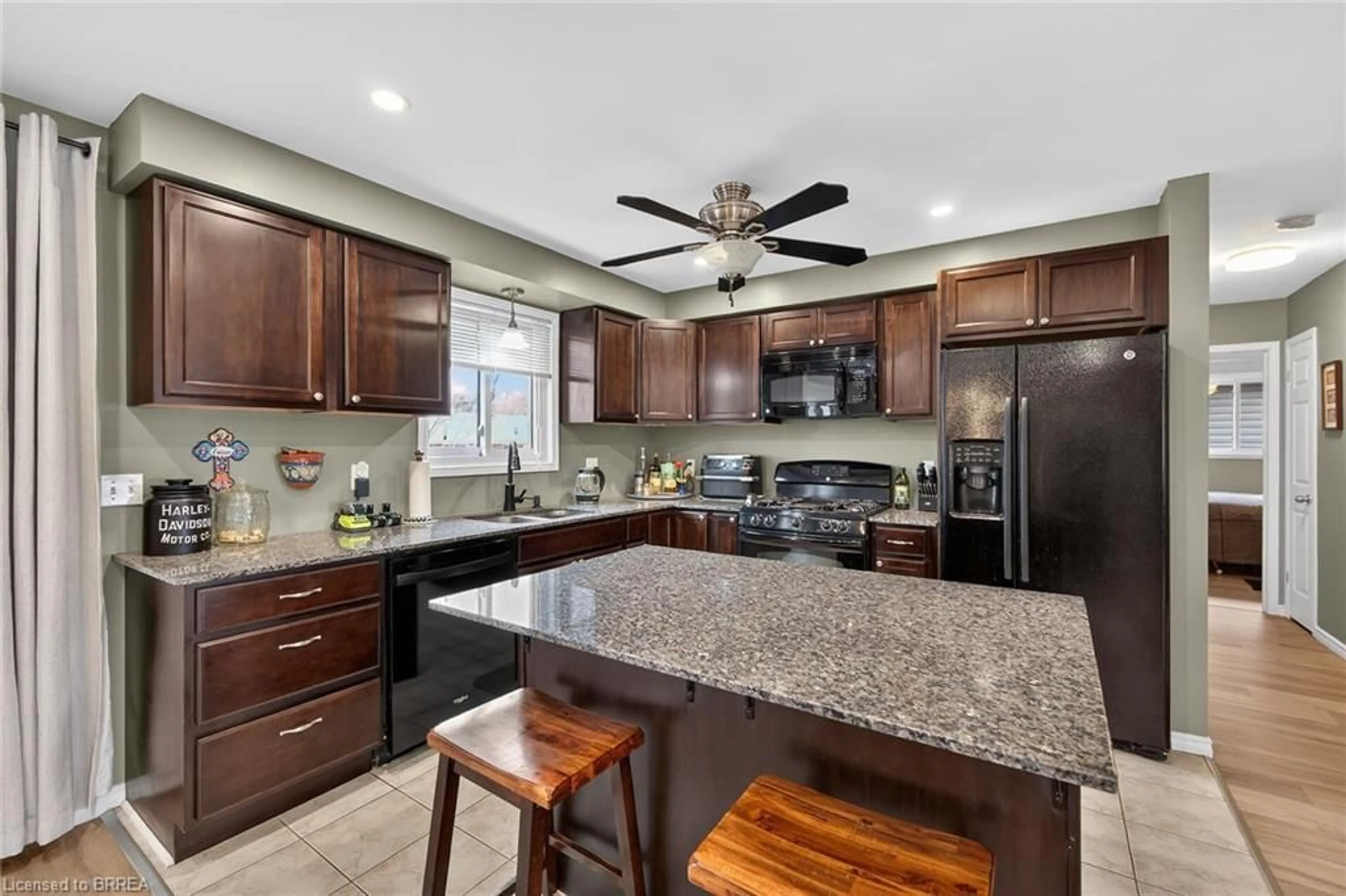 Open concept kitchen, ceramic/tile floor for 30 Mcintosh Crt, Brantford Ontario N3R 5W9