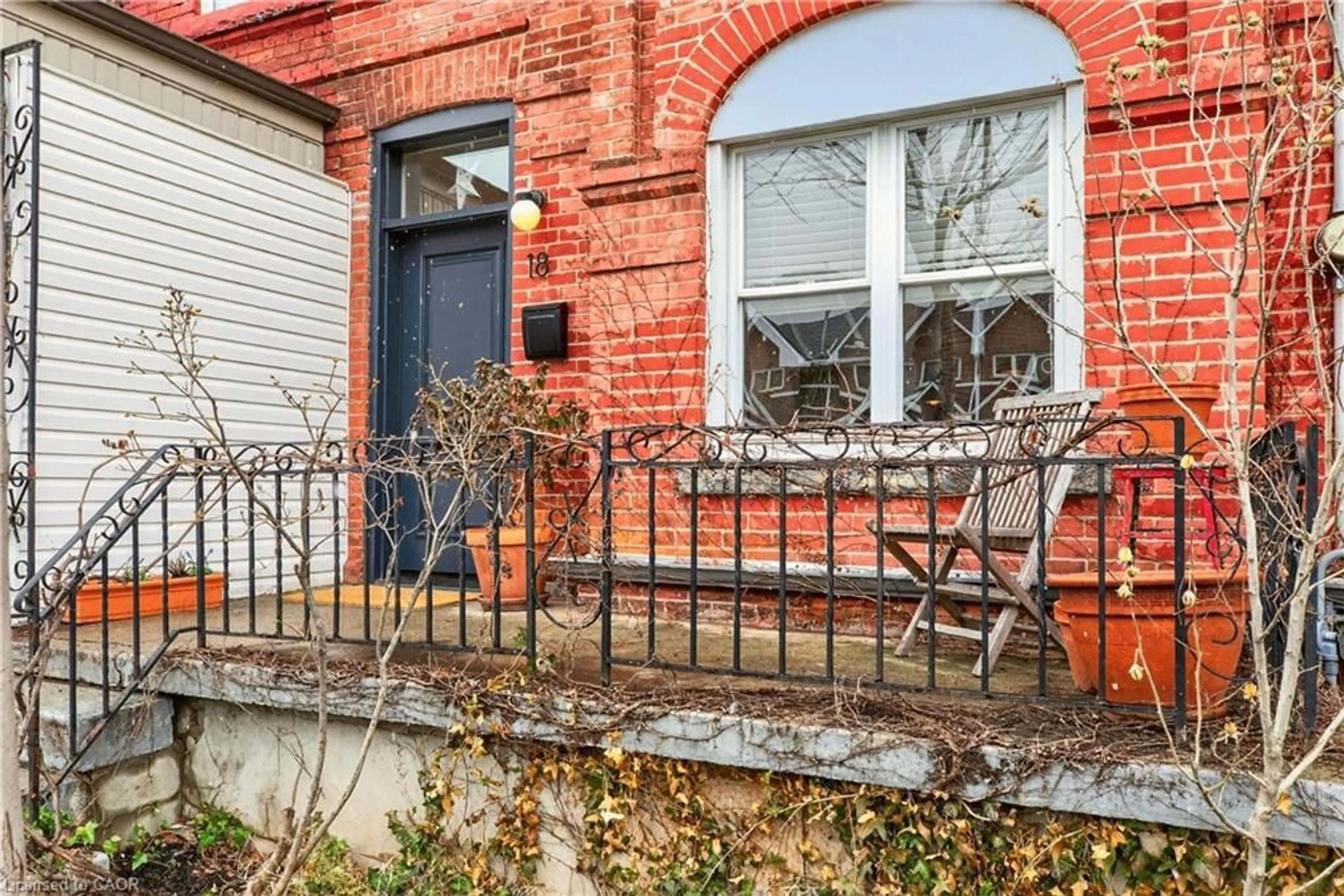 Home with brick exterior material, street for 18 St Matthews Ave, Hamilton Ontario L8L 5P3