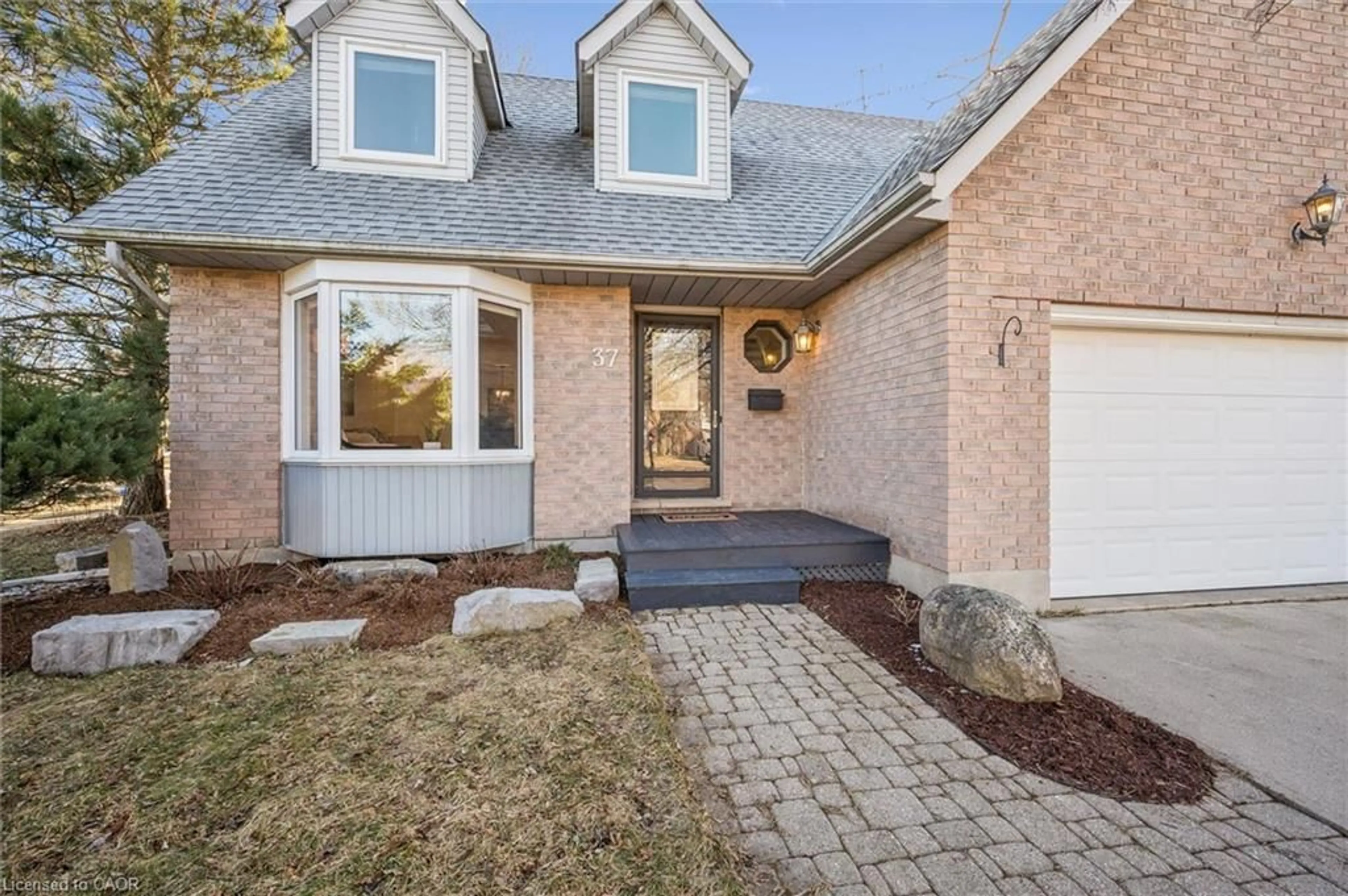 Home with brick exterior material, street for 37 Enfield Dr, Cambridge Ontario N1P 1A5