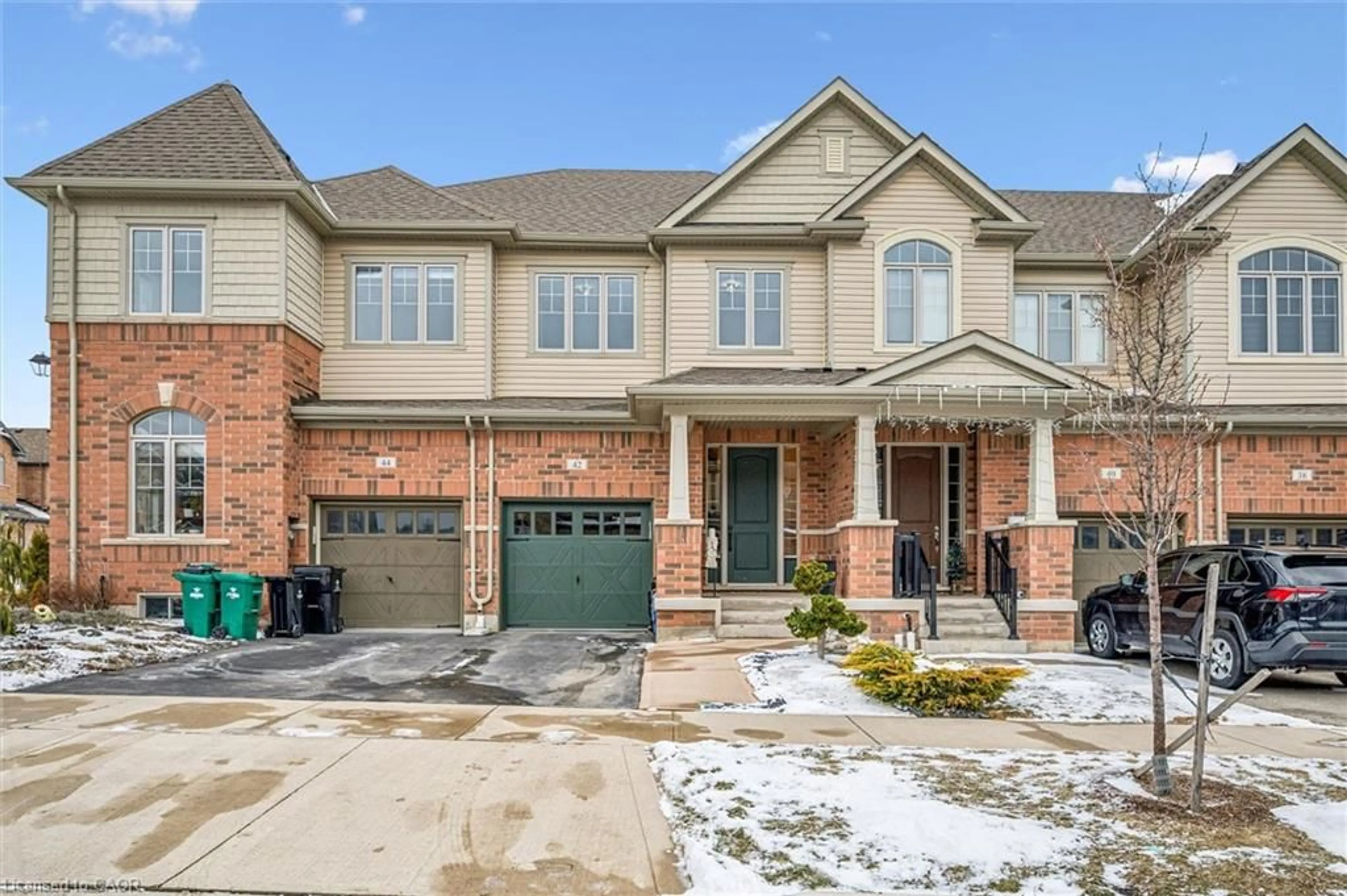 Home with brick exterior material, street for 42 Stonehill Ave, Kitchener Ontario N2R 0N8