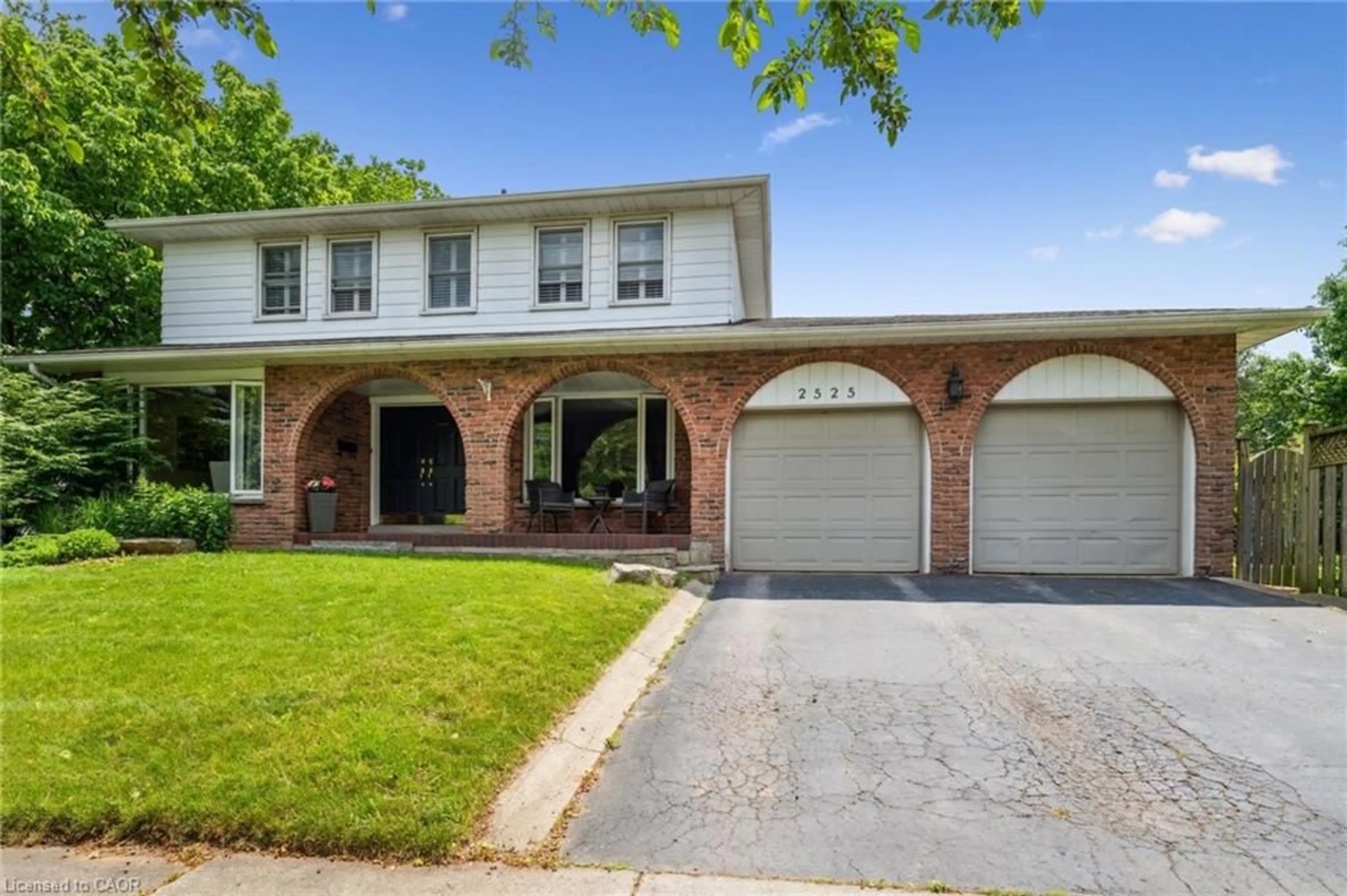Home with brick exterior material, street for 2525 Woburn Cres, Oakville Ontario L6L 5E8