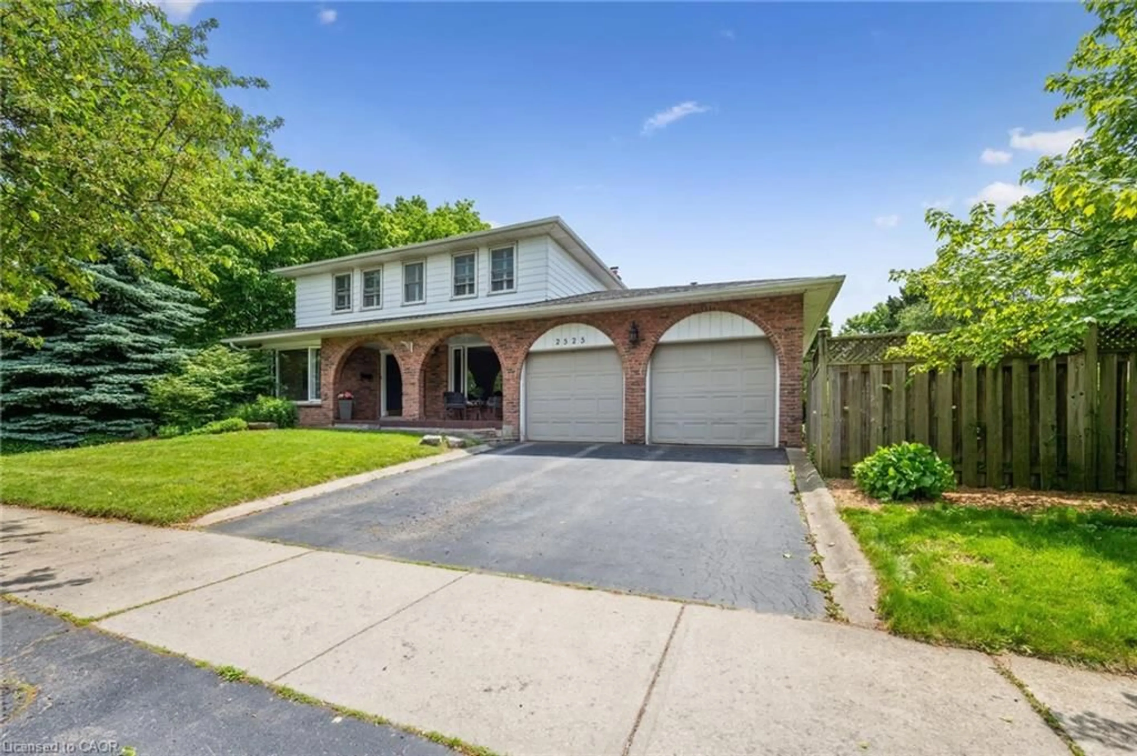 Home with brick exterior material, street for 2525 Woburn Cres, Oakville Ontario L6L 5E8