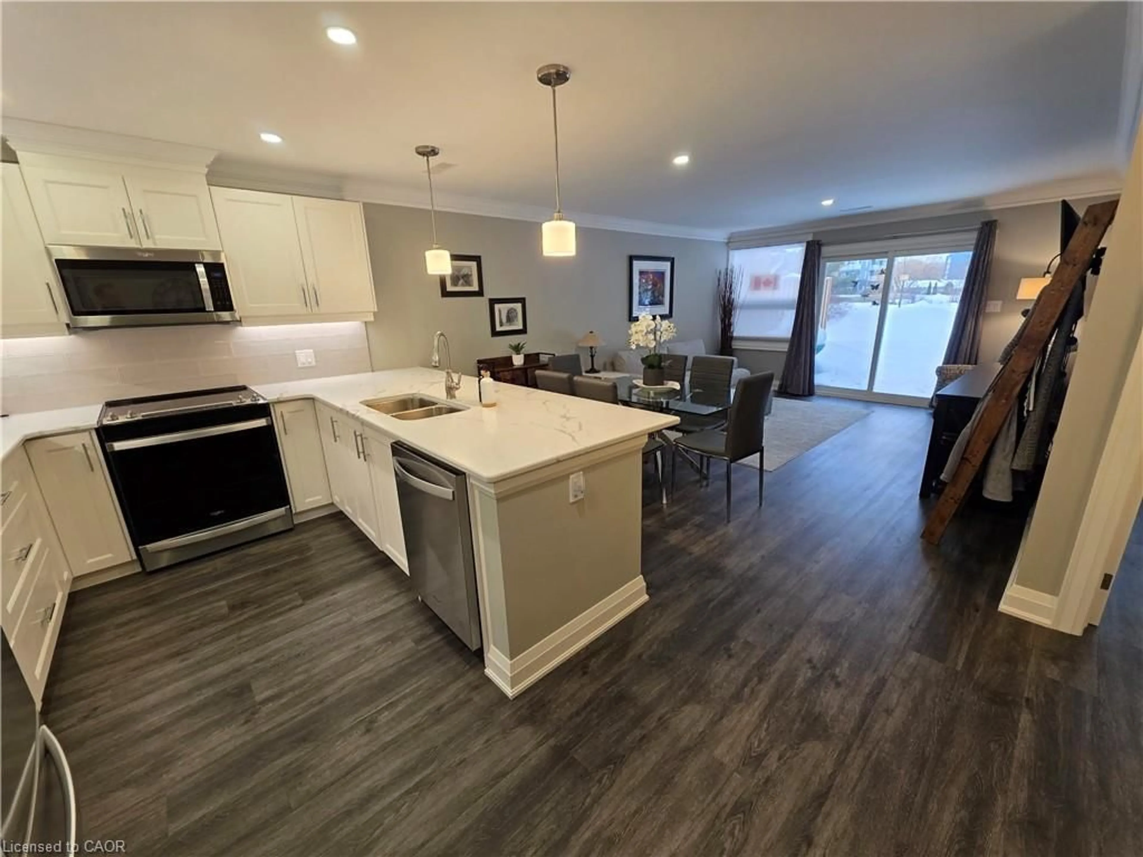 Open concept kitchen, wood/laminate floor for 52 Gates Lane, Hamilton Ontario L9B 1T8