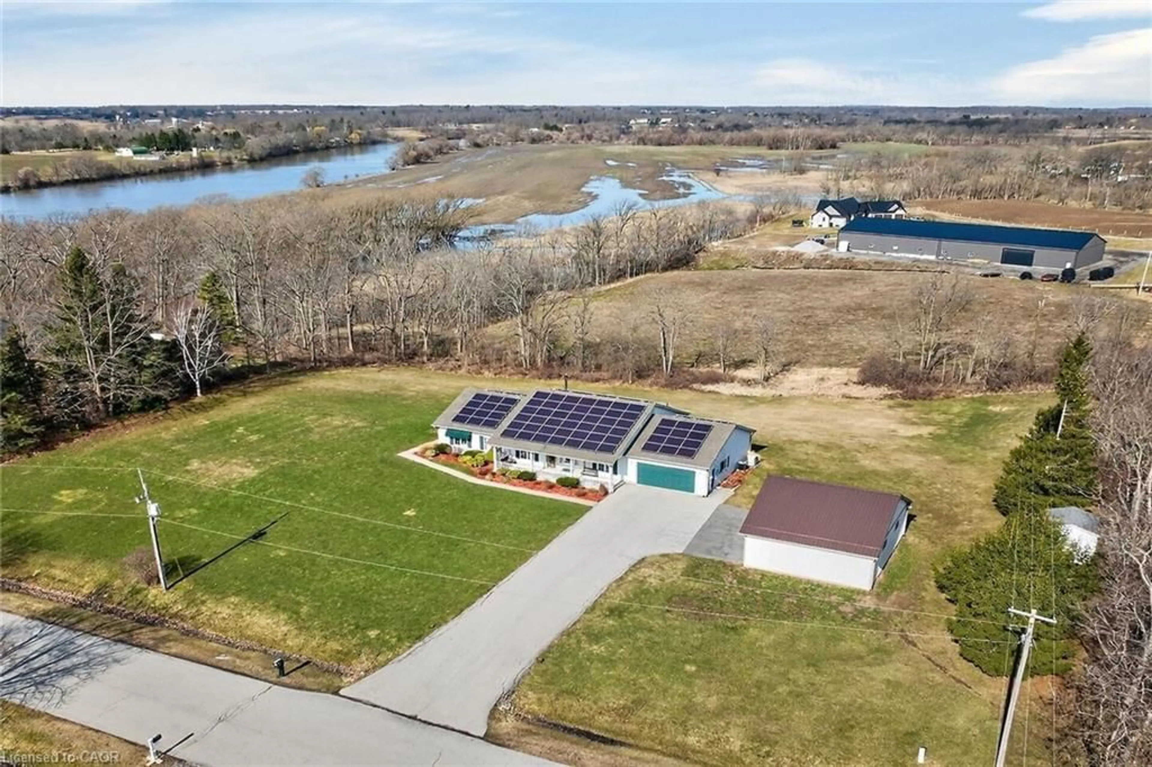 A pic from outside/outdoor area/front of a property/back of a property/a pic from drone, water/lake/river/ocean view for 2 Foxlow Cres, Cayuga Ontario N0A 1E0