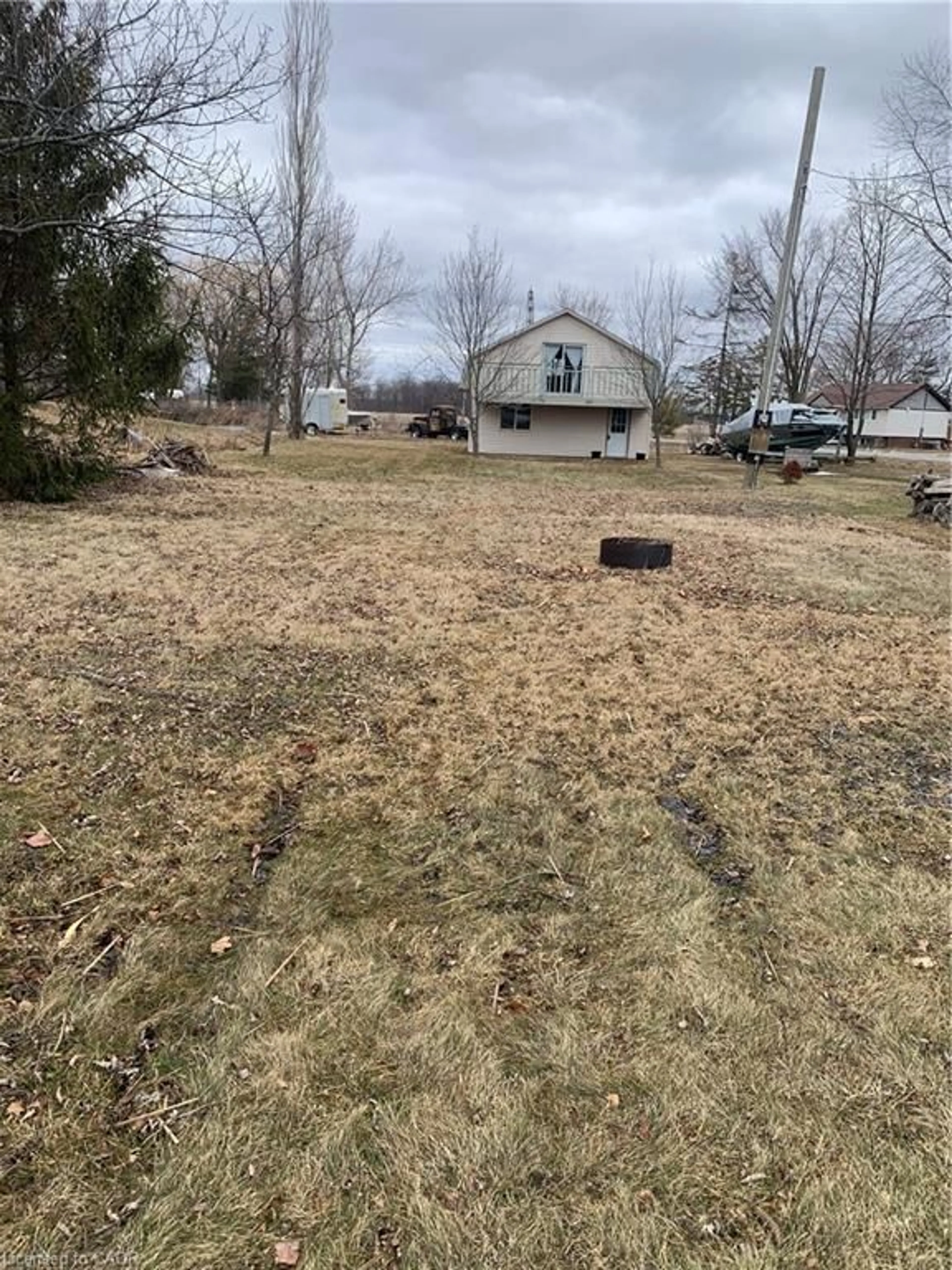 A pic from outside/outdoor area/front of a property/back of a property/a pic from drone, street for 6 Villella Rd, Lowbanks Ontario N0A 1K0