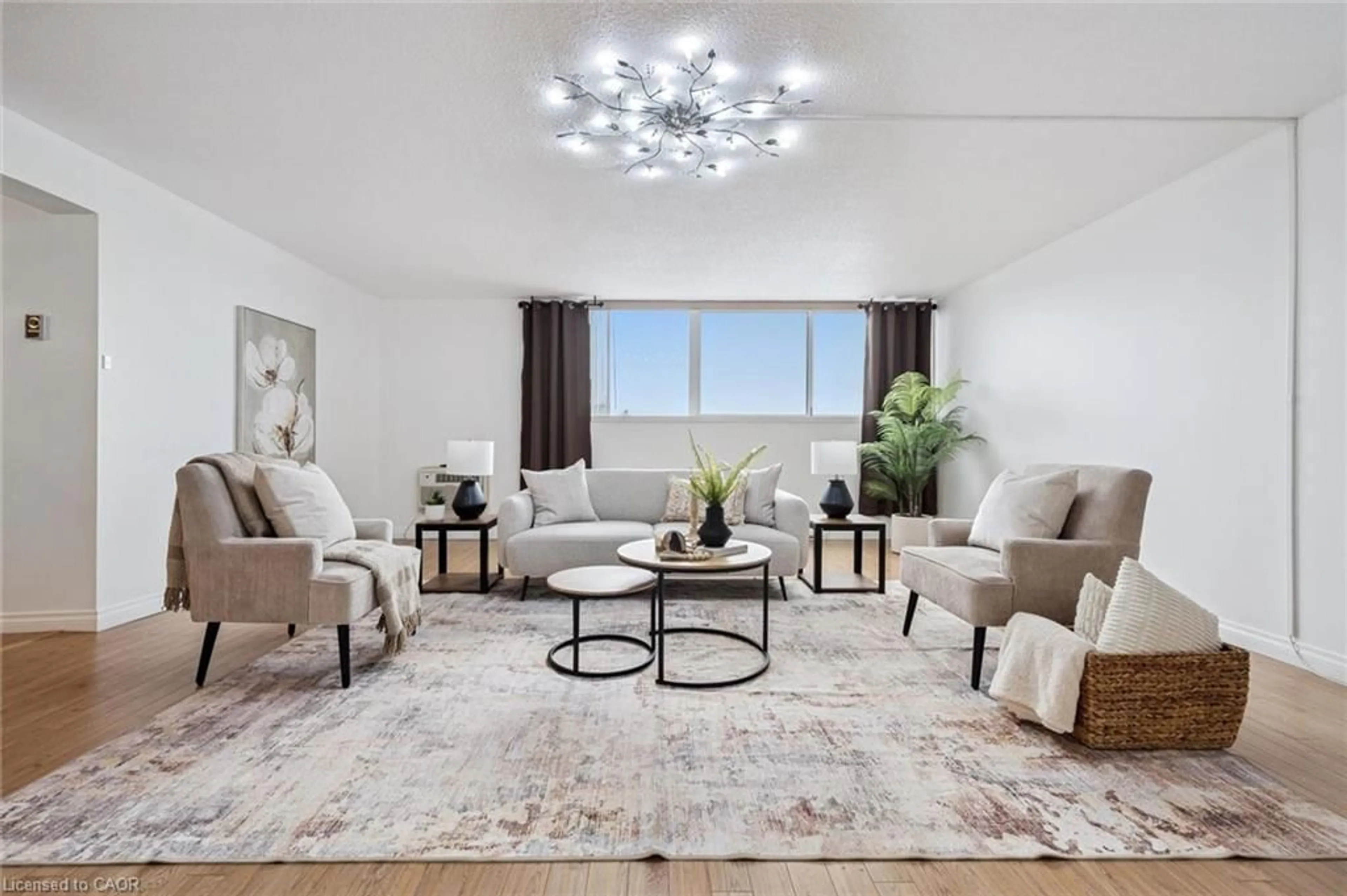 Living room with furniture, unknown for 93 Westwood Rd #607, Guelph Ontario N1H 7J7