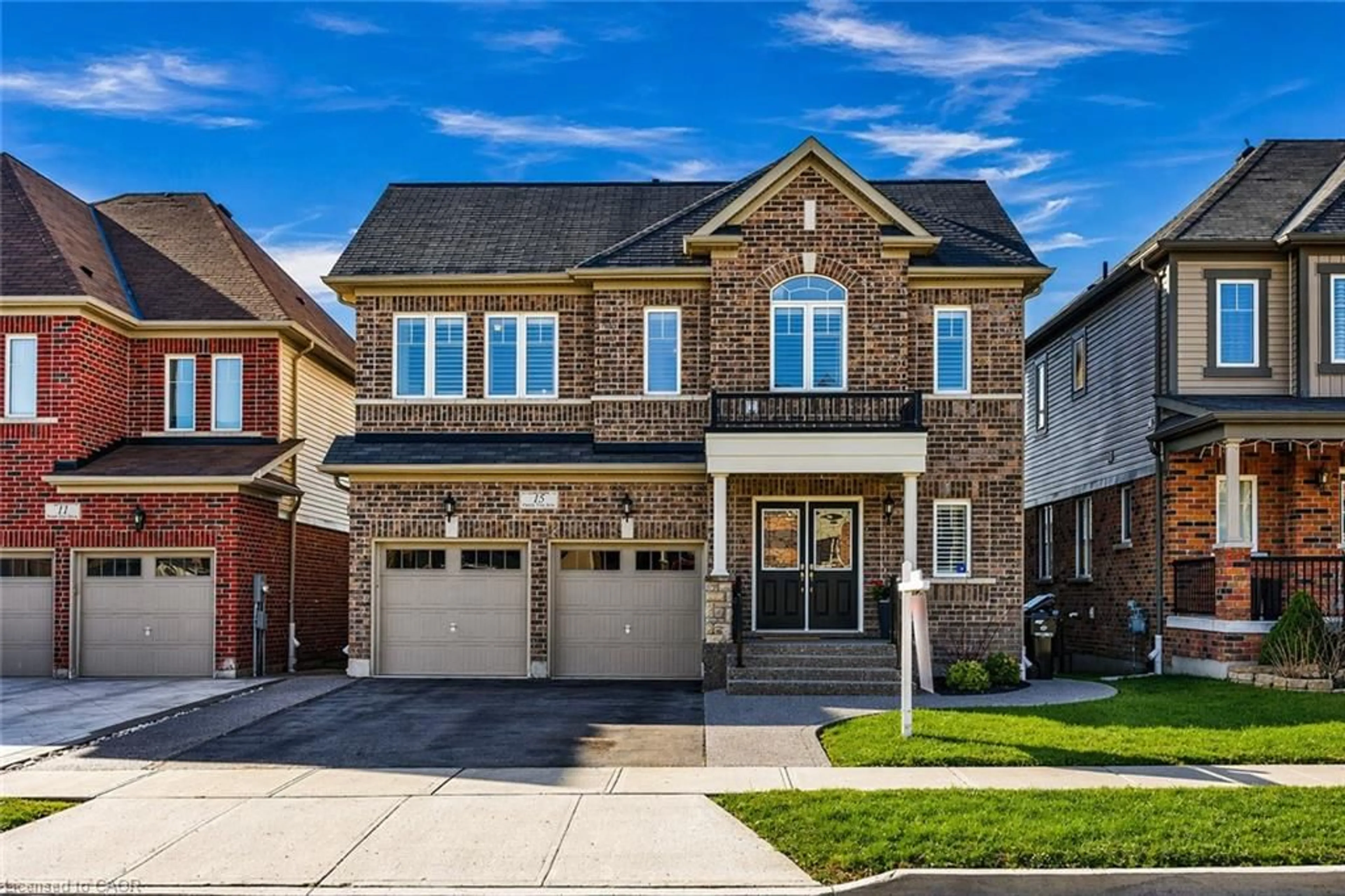 Home with brick exterior material, street for 15 Pieter Vos Dr, Kitchener Ontario N2P 0G1