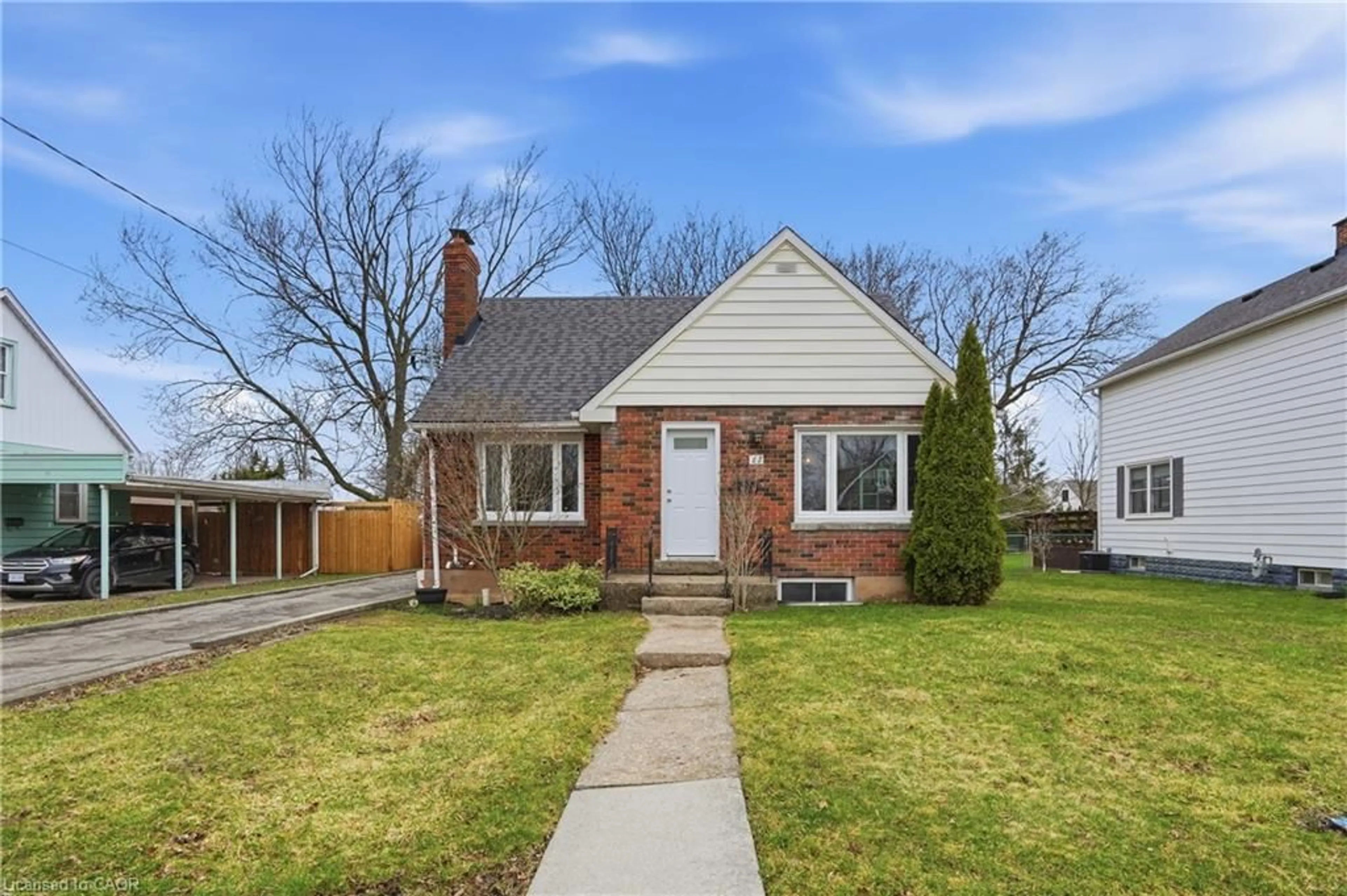 Home with brick exterior material, street for 22 Greenwood Ave, Welland Ontario L3C 4B2