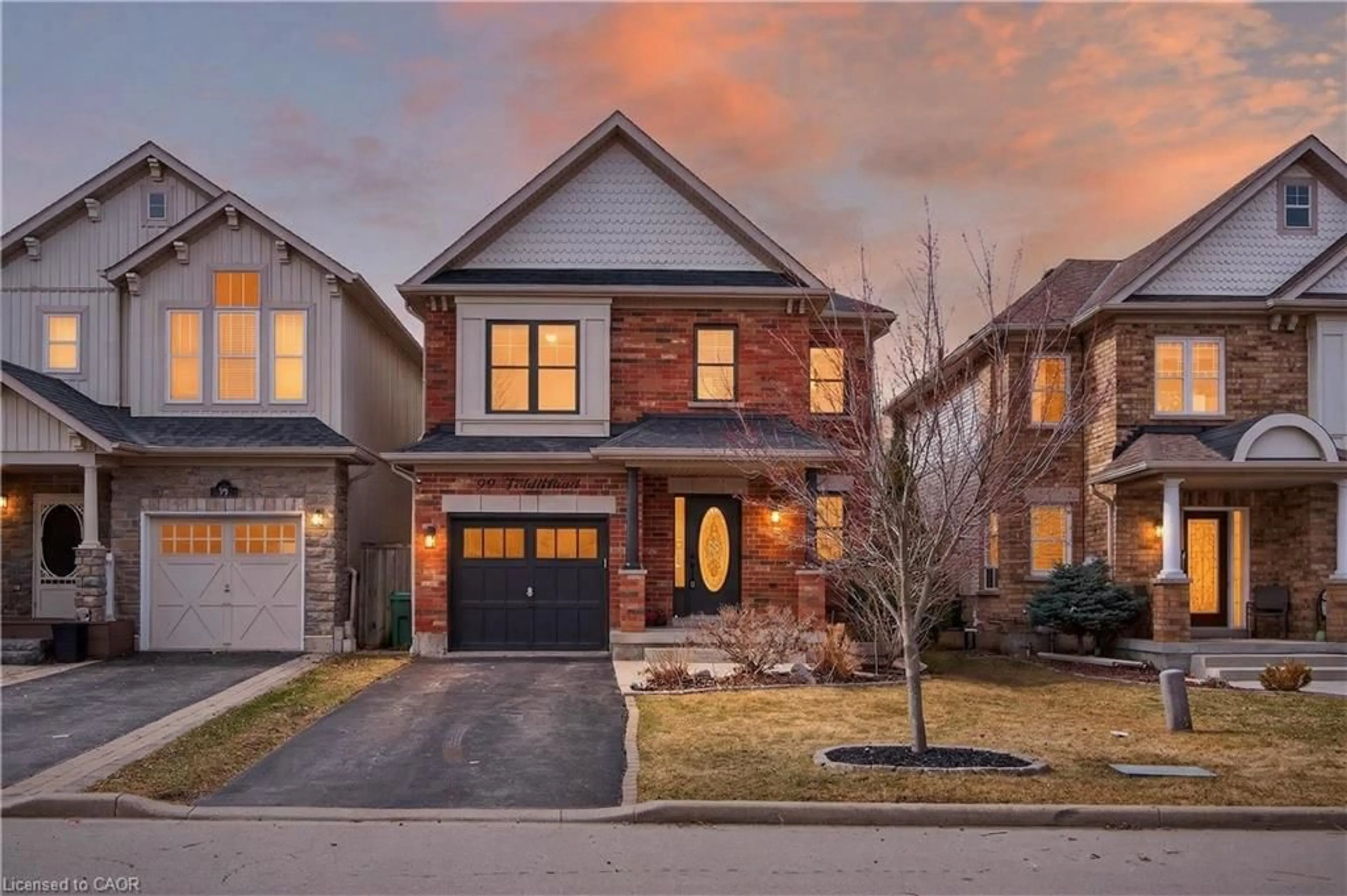 Home with brick exterior material, street for 99 Fiddlehead Cres, Waterdown Ontario L8B 0Y1
