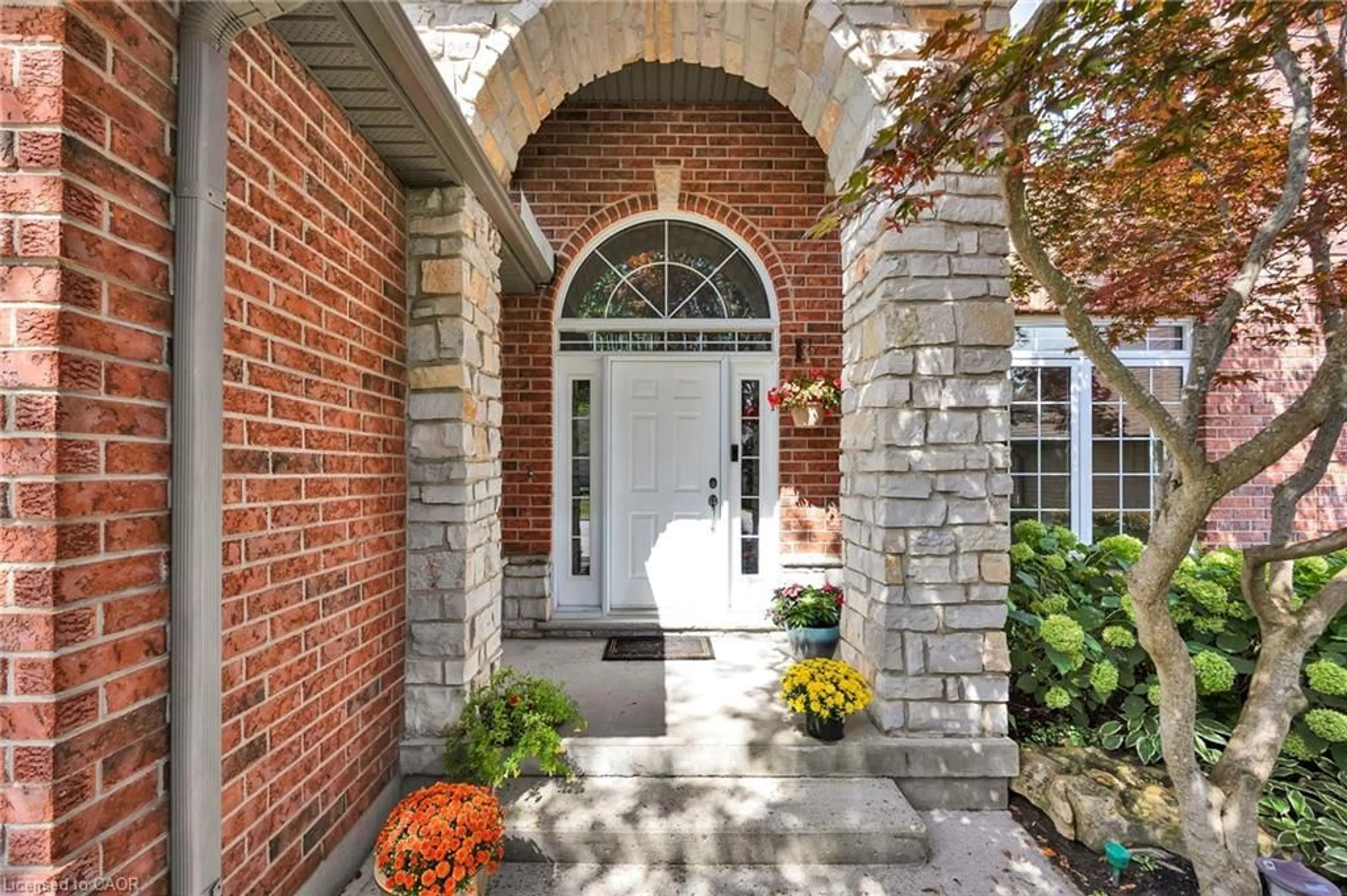 Home with brick exterior material, street for 232 The Lions Gate, Waterloo Ontario N2L 6M5