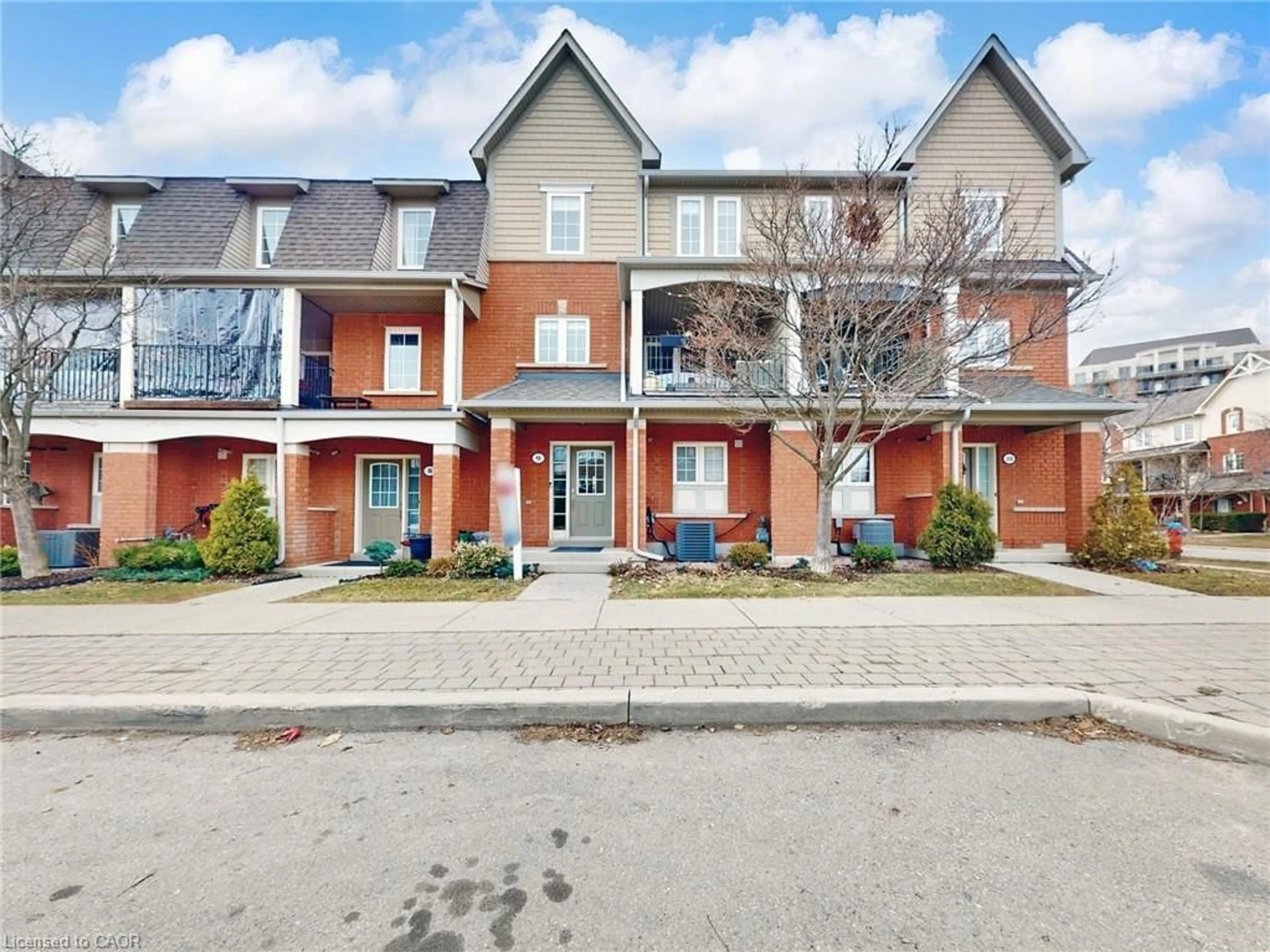Home with brick exterior material, street for 2360 Parkhaven Blvd #9, Halton Ontario L6H 7S6