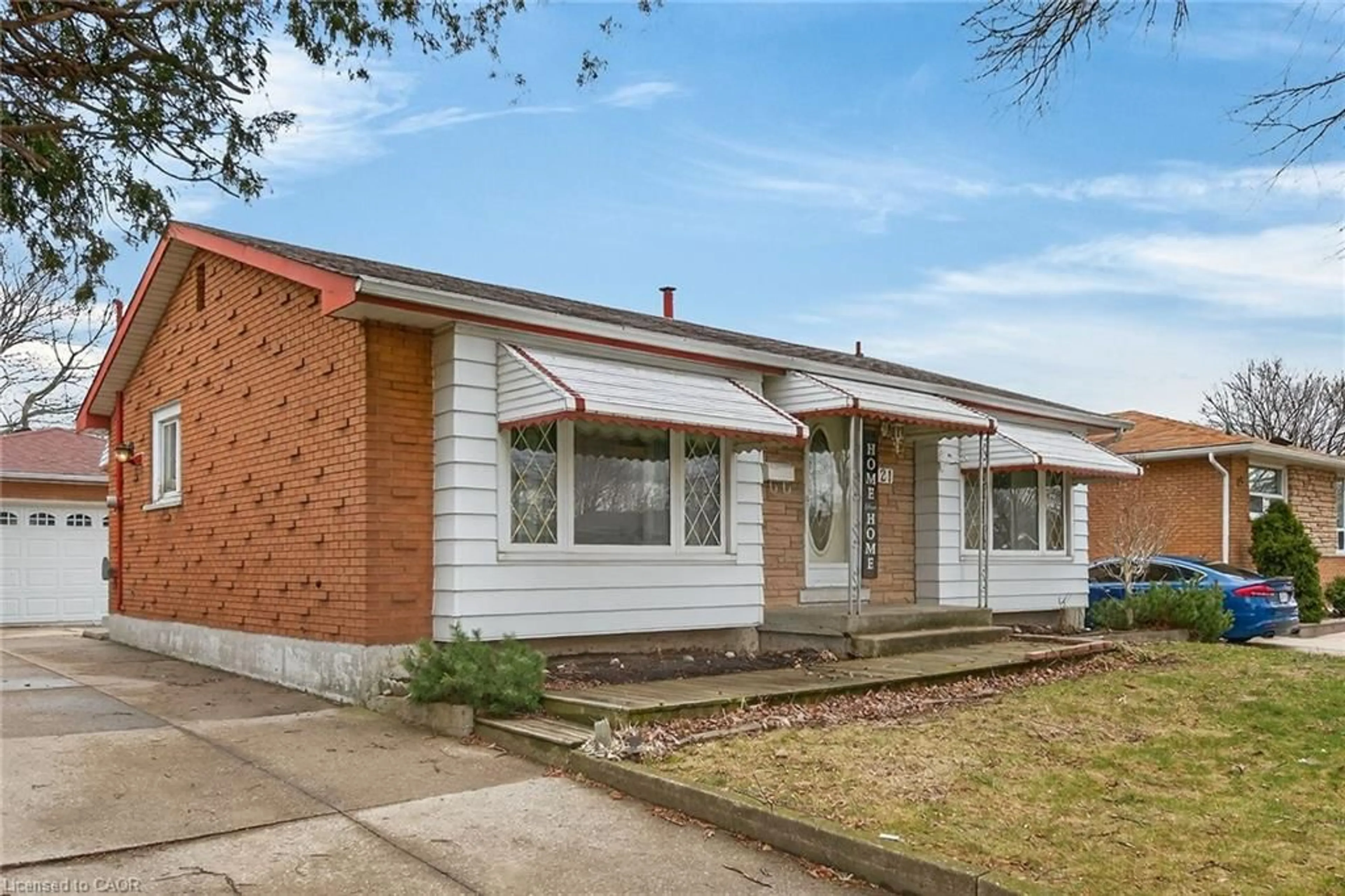 Home with brick exterior material, building for 21 Bluebird Ave, Hamilton Ontario L9A 3W4