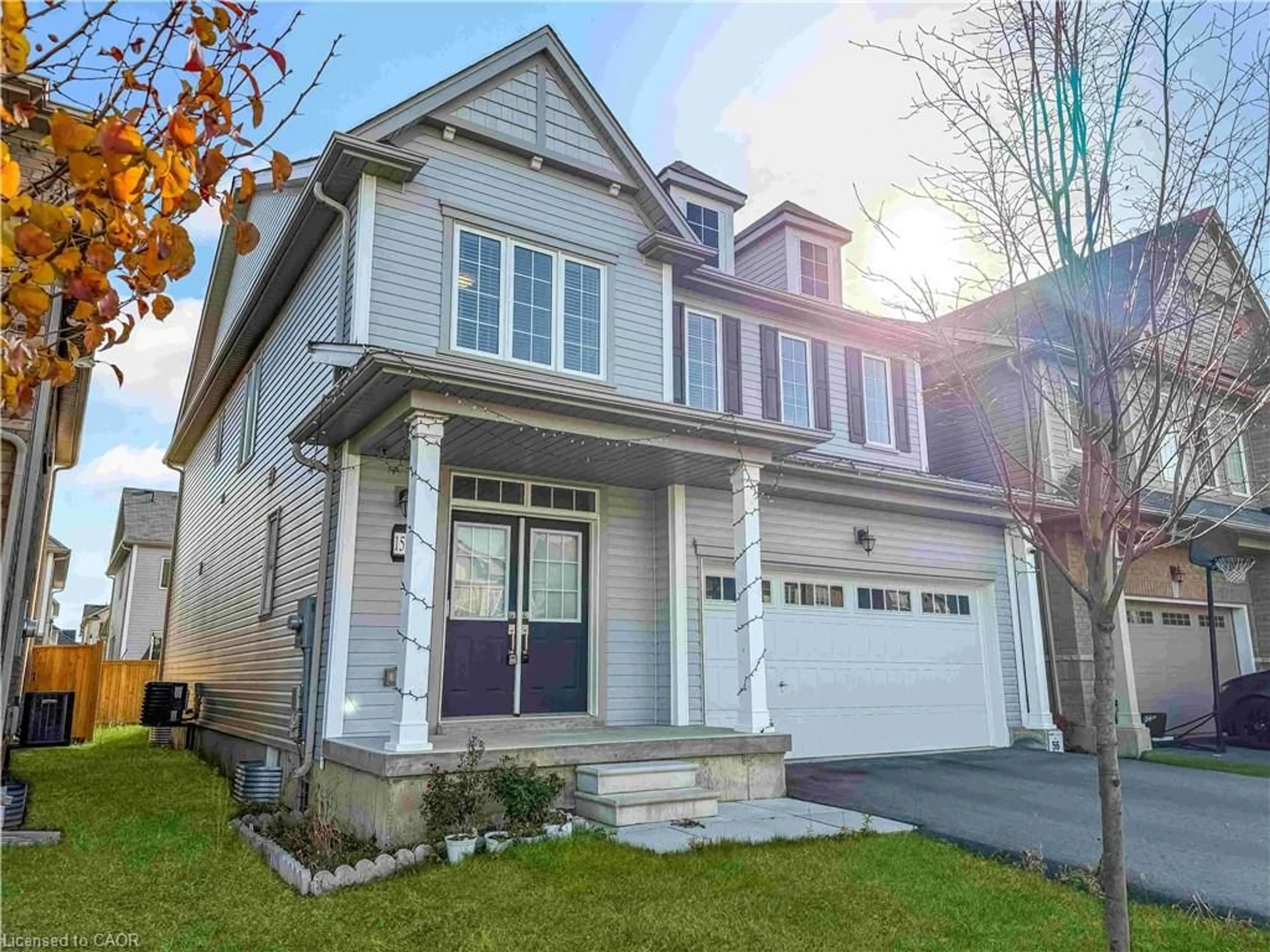 Home with vinyl exterior material, street for 159 Longboat Run, Brantford Ontario N3T 0R9