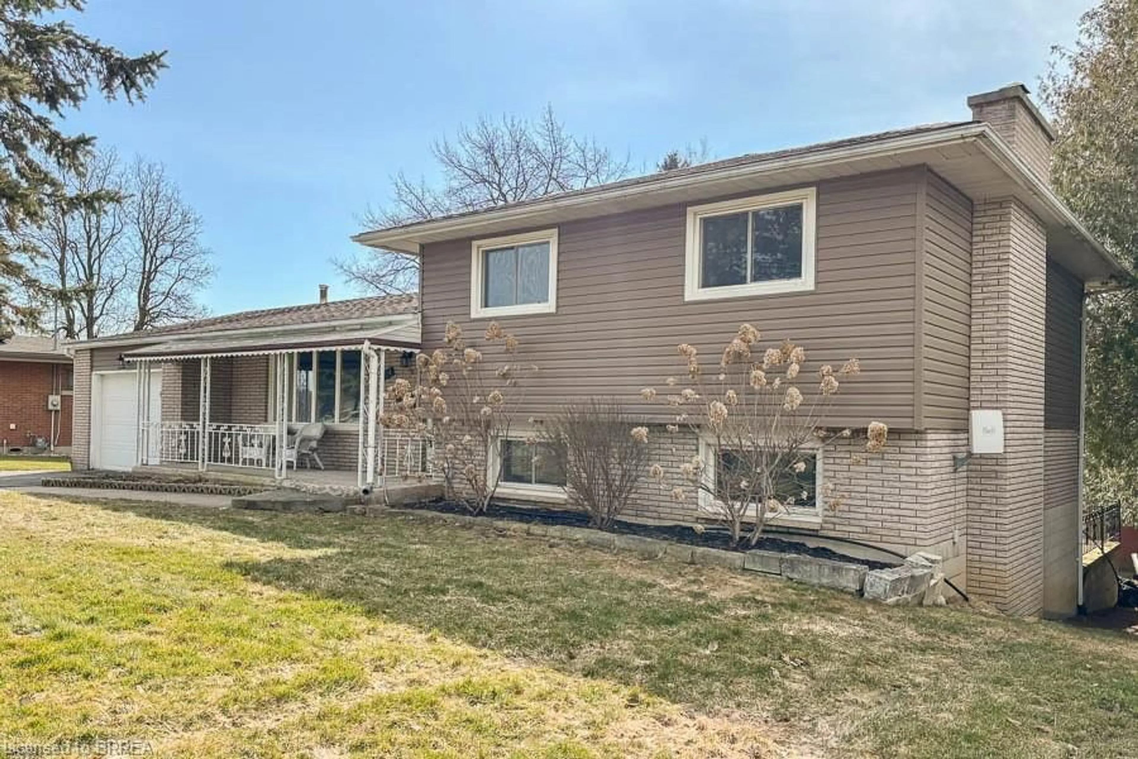 Home with brick exterior material, street for 104 Hillside Ave, Delhi Ontario N4B 1Y7