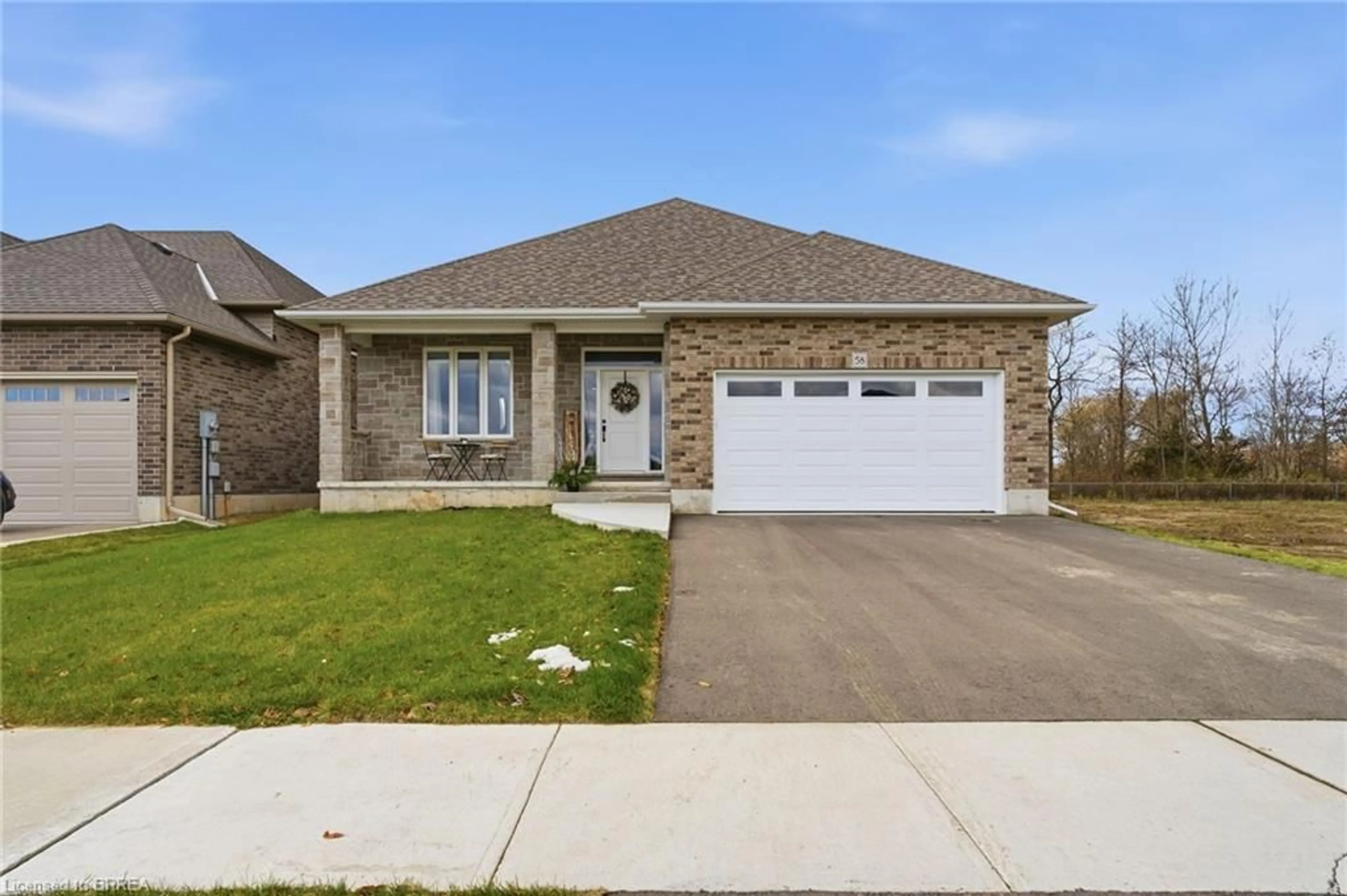 Home with brick exterior material, street for 58 Vanrooy Trail, Waterford Ontario N0E 1Y0