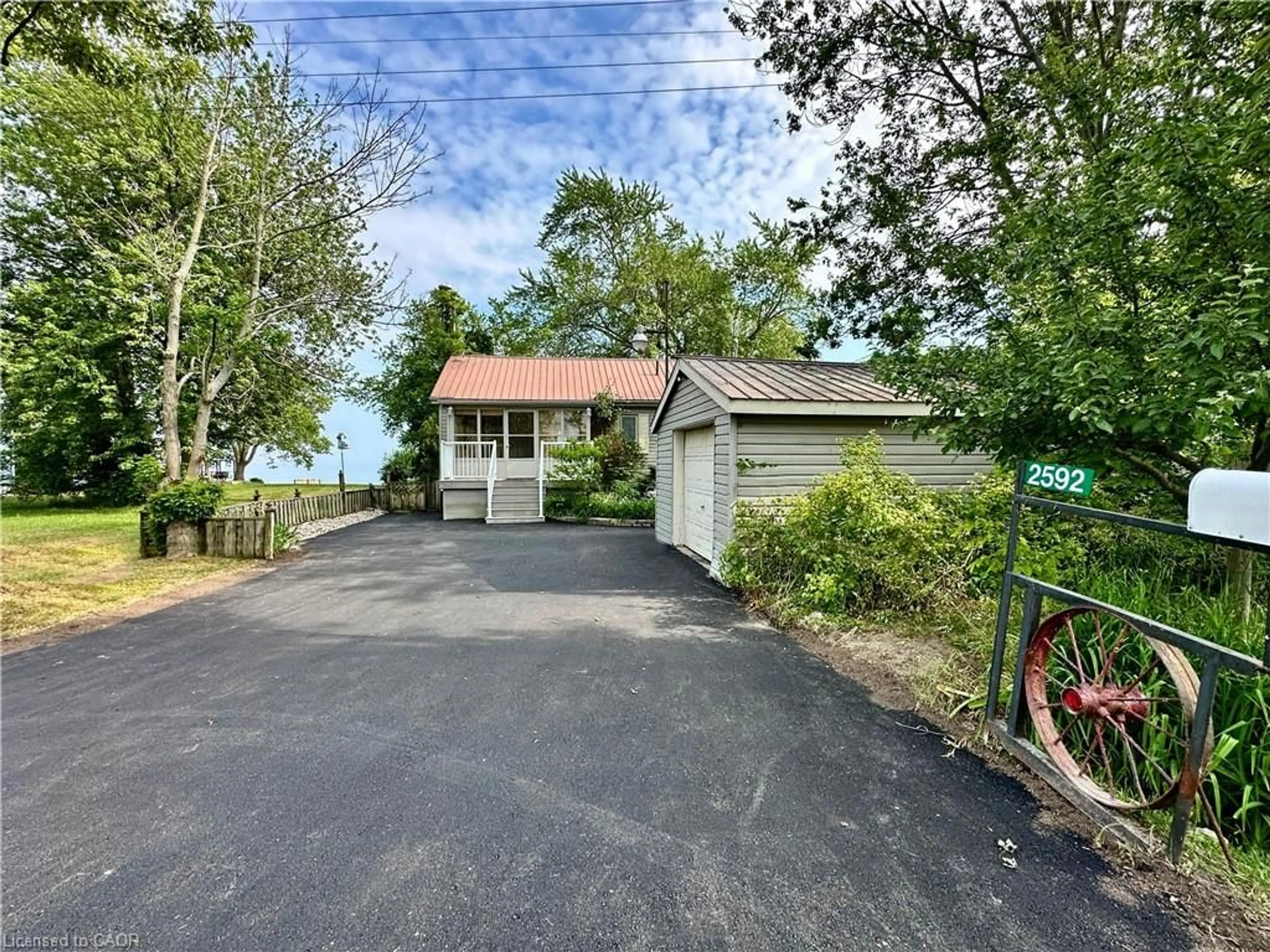A pic from outside/outdoor area/front of a property/back of a property/a pic from drone, water/lake/river/ocean view for 2592 Lakeshore Rd, Dunnville Ontario N1A 2W8