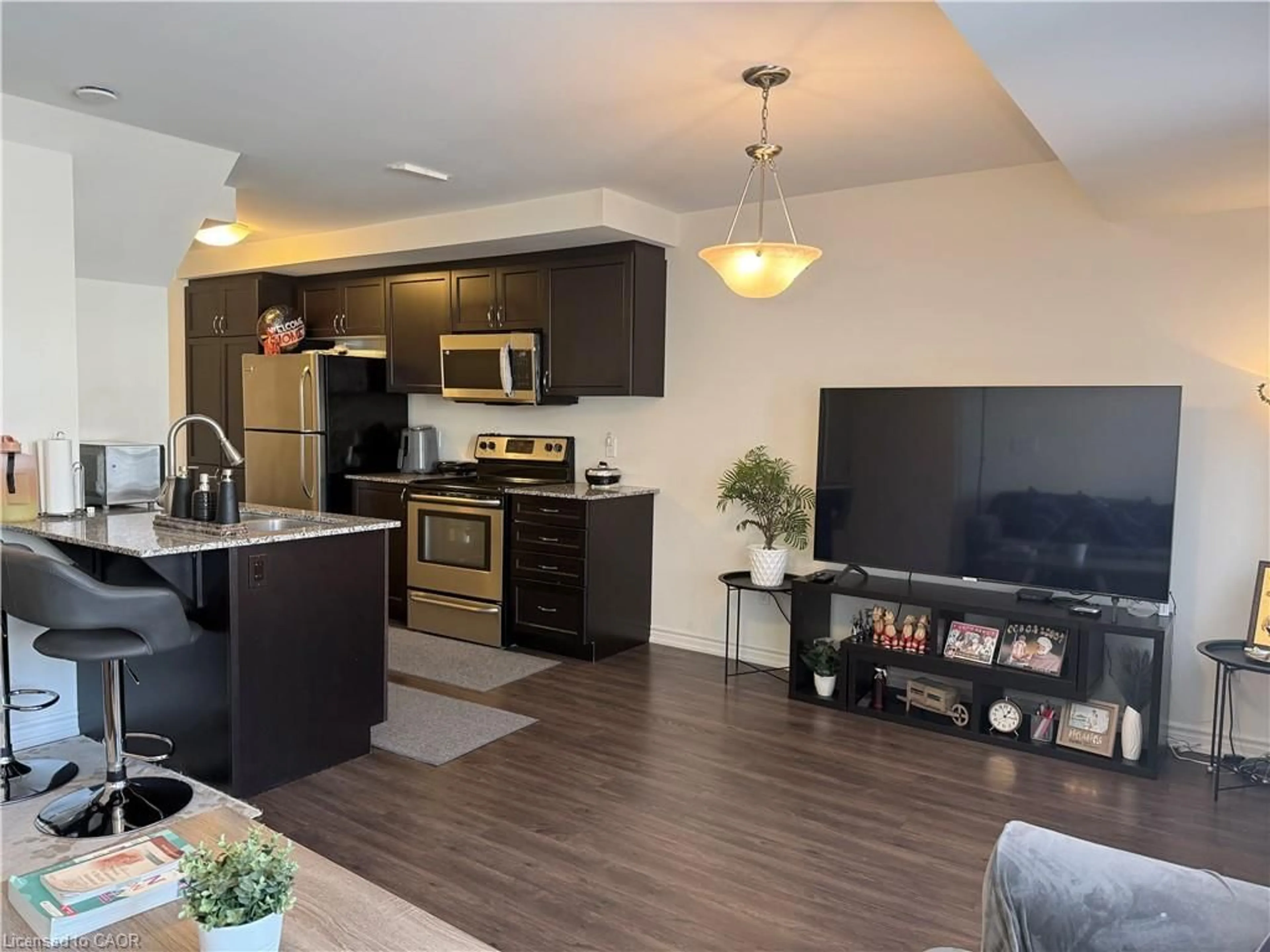 Open concept kitchen, wood/laminate floor for 922 Apple Hill Lane, Kitchener Ontario N2R 0L7