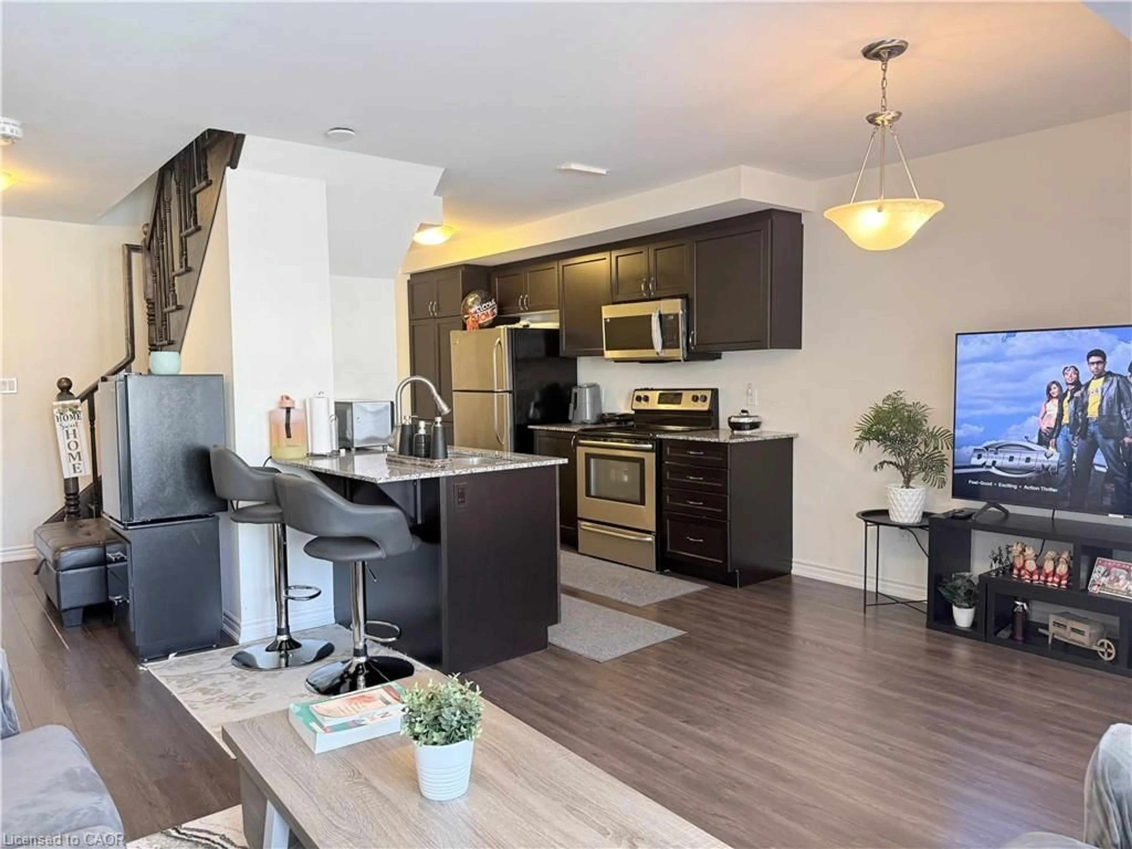 Open concept kitchen, wood/laminate floor for 922 Apple Hill Lane, Kitchener Ontario N2R 0L7