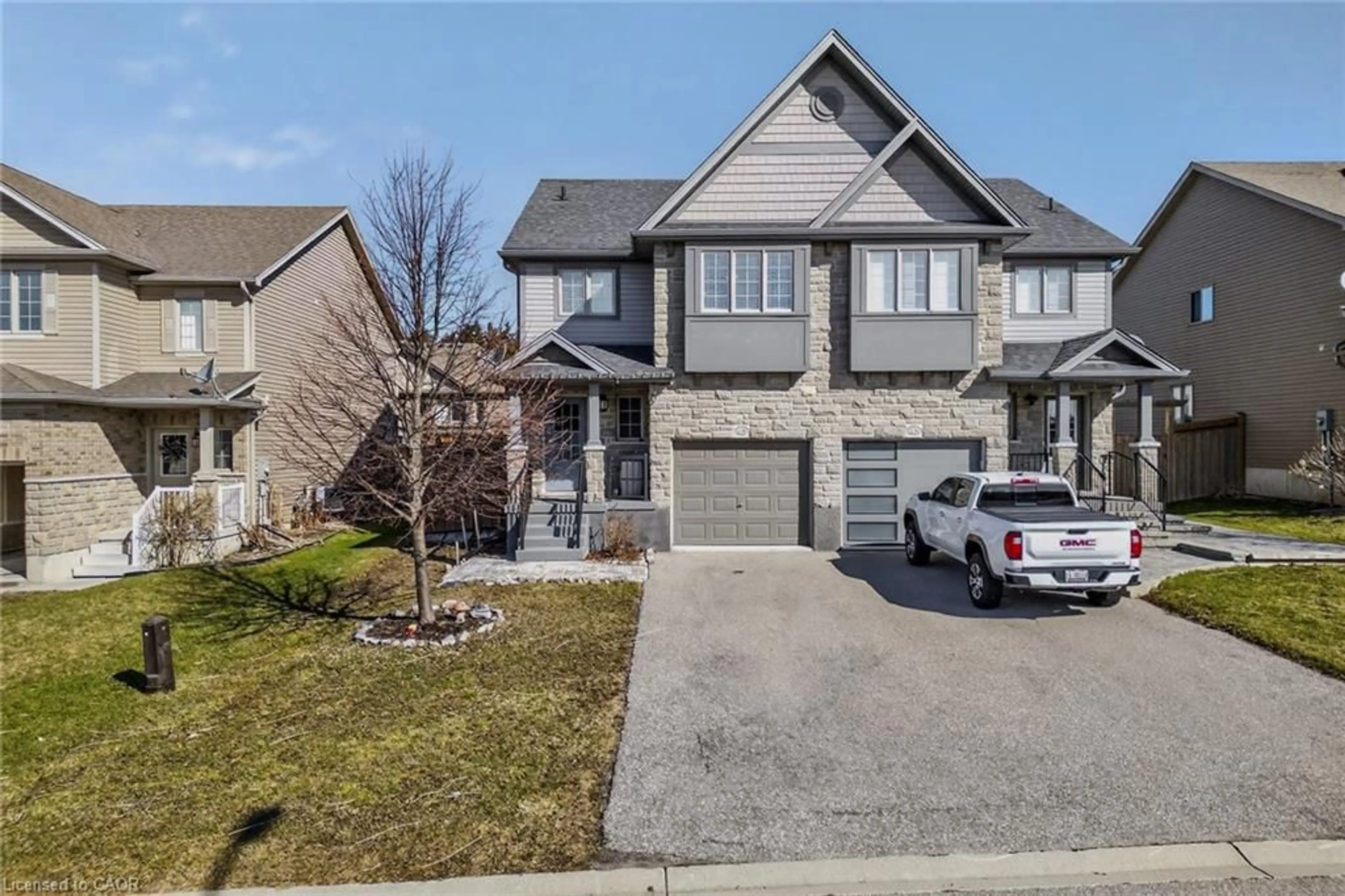 Home with brick exterior material, street for 45 Trillium Way, Simcoe Ontario N3Y 4K2